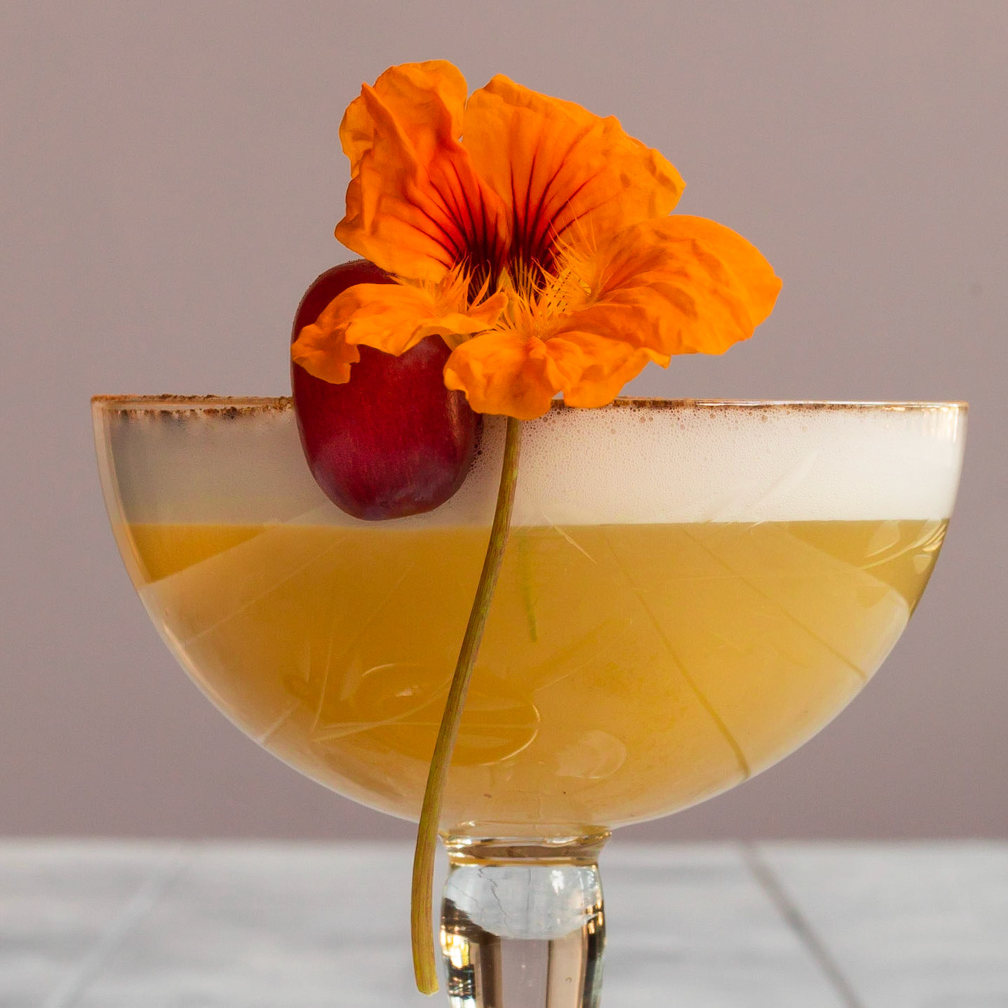 autumn grape sour: featured by the feed feed cocktails