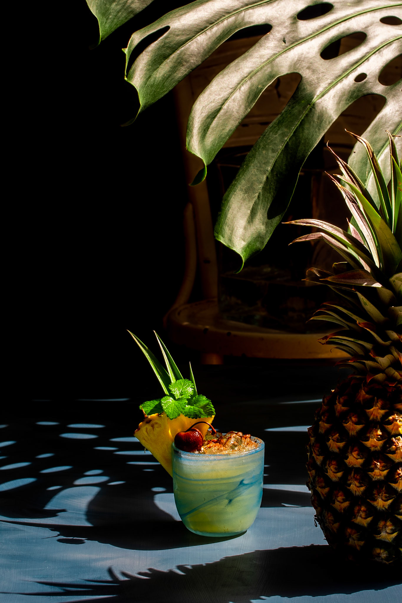 pineapple shrub mai tai framed by shadows, featured by @ceylonarrack