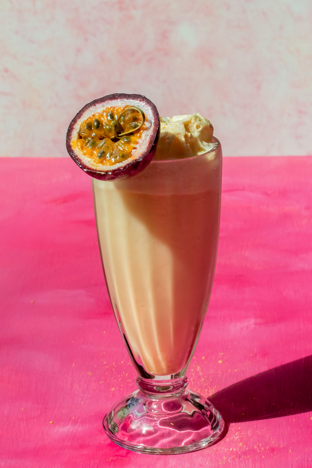 passionfruit cream lactart fancy vintage style soda with passionfruit garnish