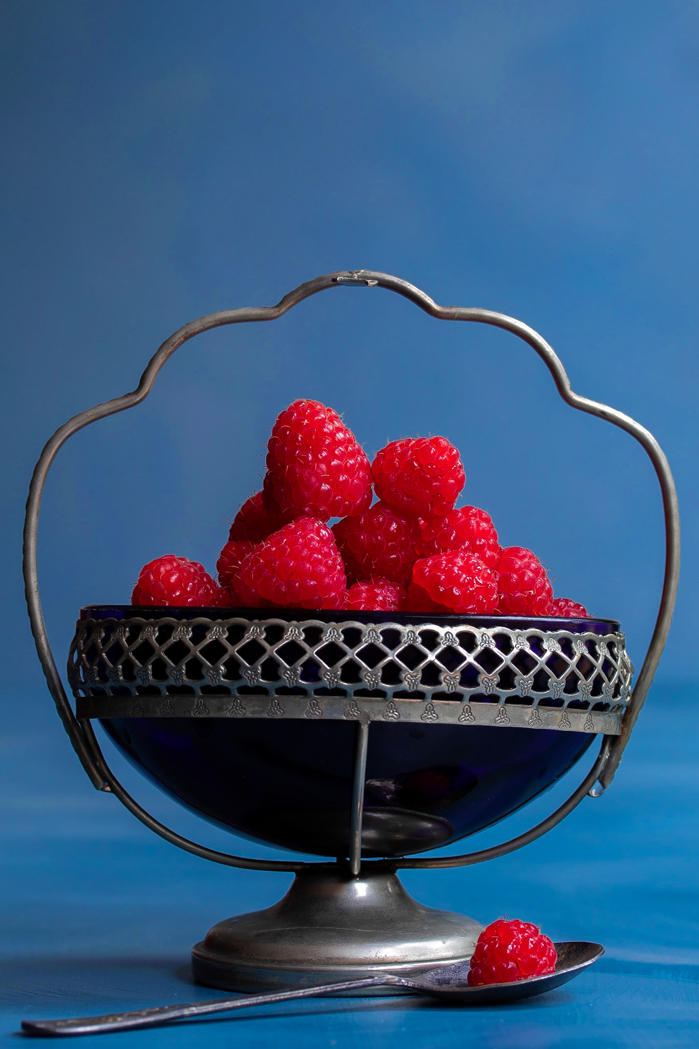 raspberries in vintage blue glass sugar bowl, menu development project