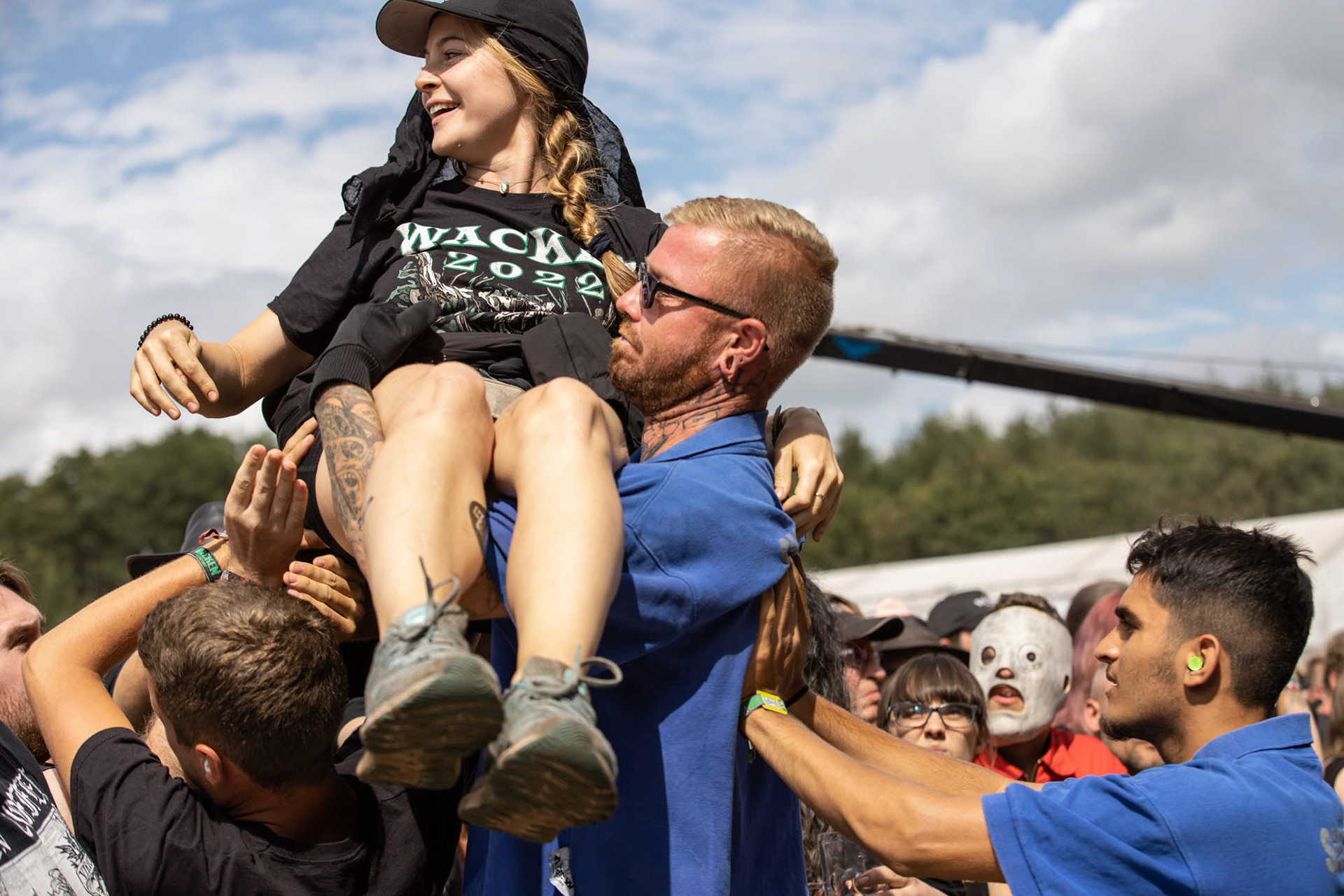 Metalheads at Wacken Open Air 2022, Crowdsurfing