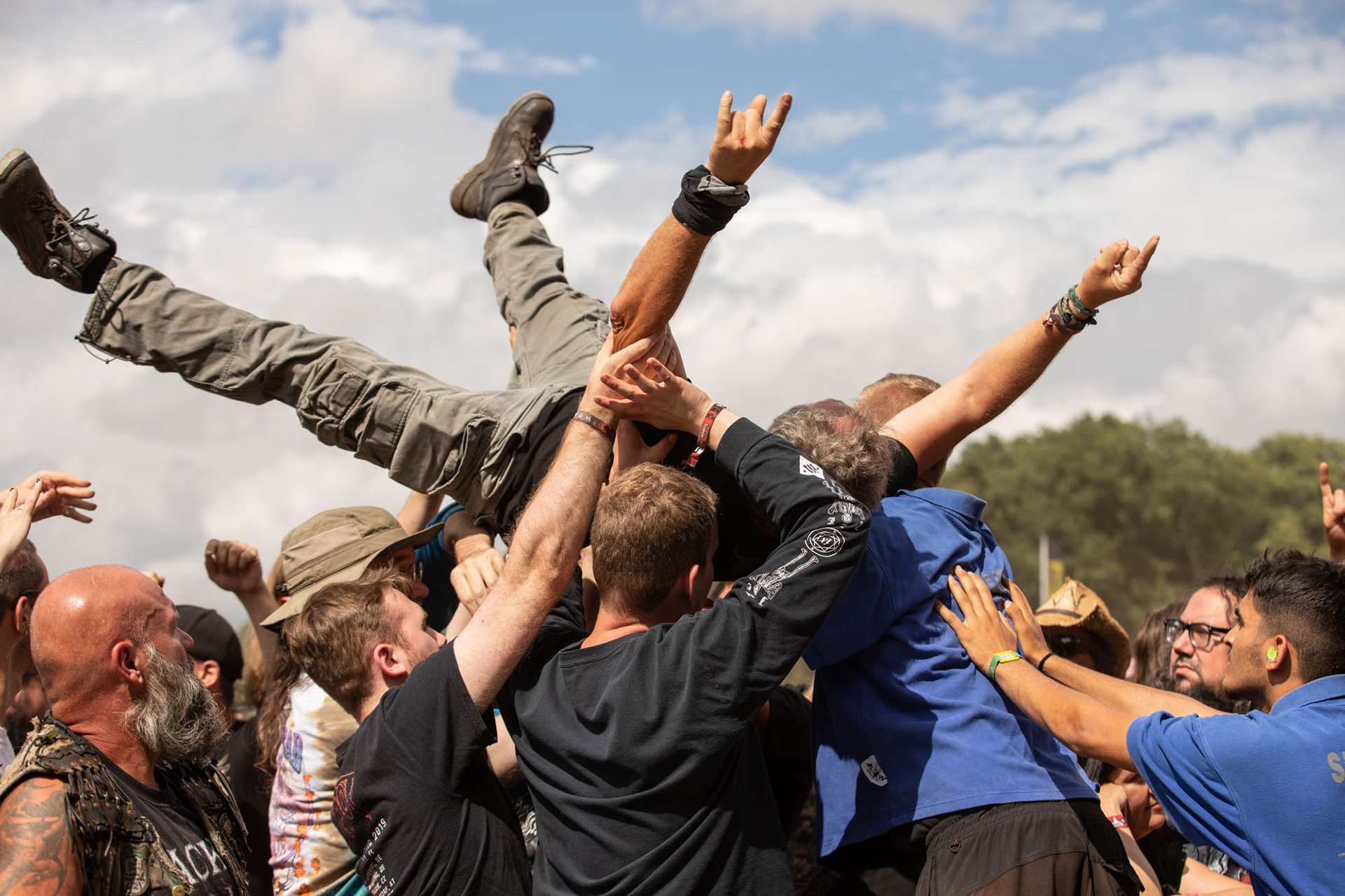 Metalheads at Wacken Open Air 2022, Crowdsurfing