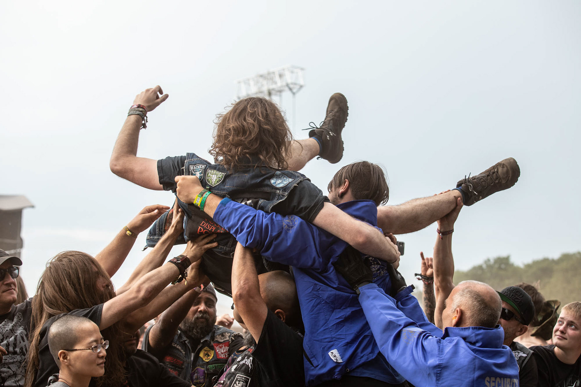 Metalheads at Wacken Open Air 2022, Crowdsurfing