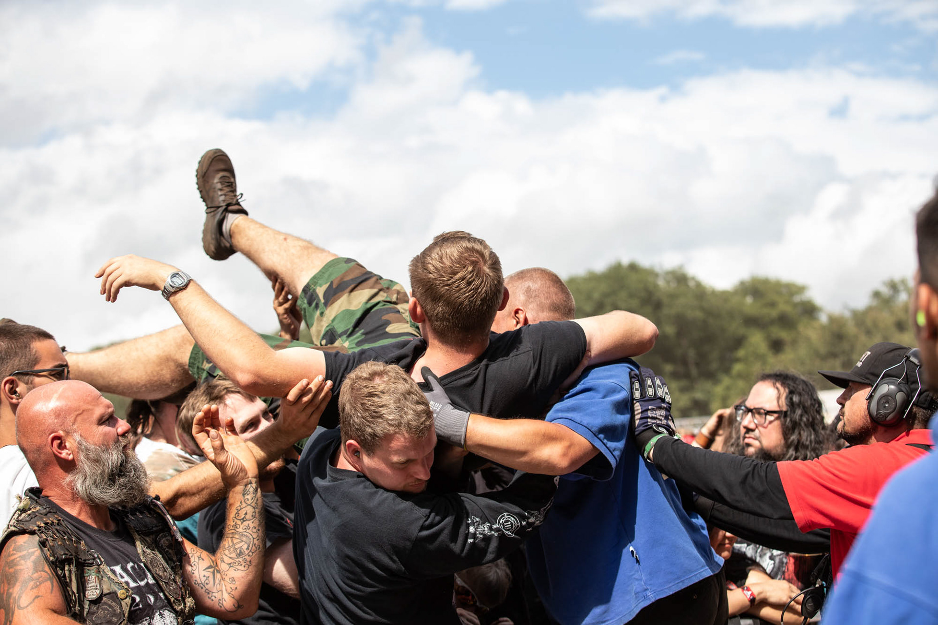 Metalheads at Wacken Open Air 2022, Crowdsurfing