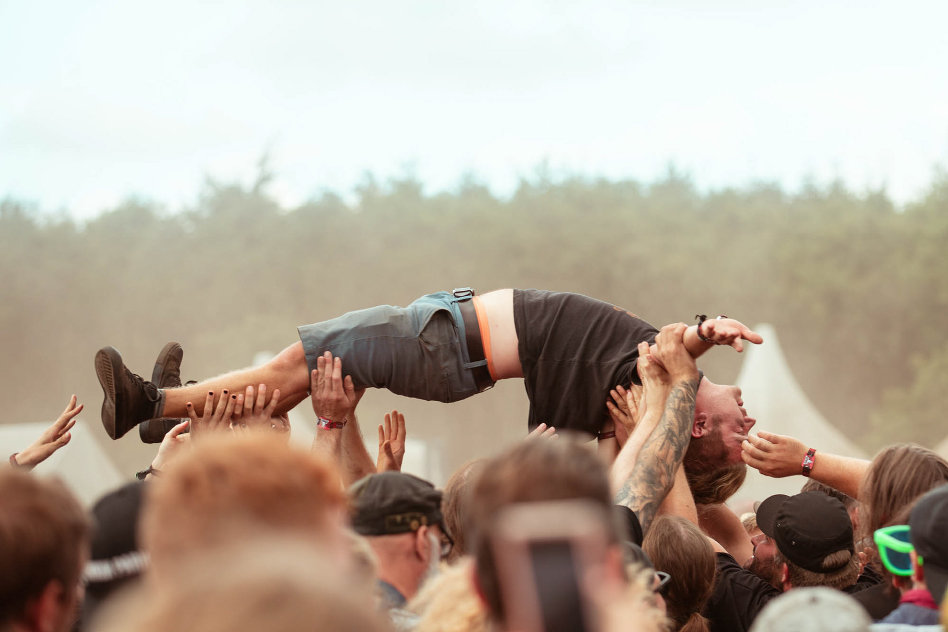 Metalheads at Wacken Open Air 2022, Crowdsurfing
