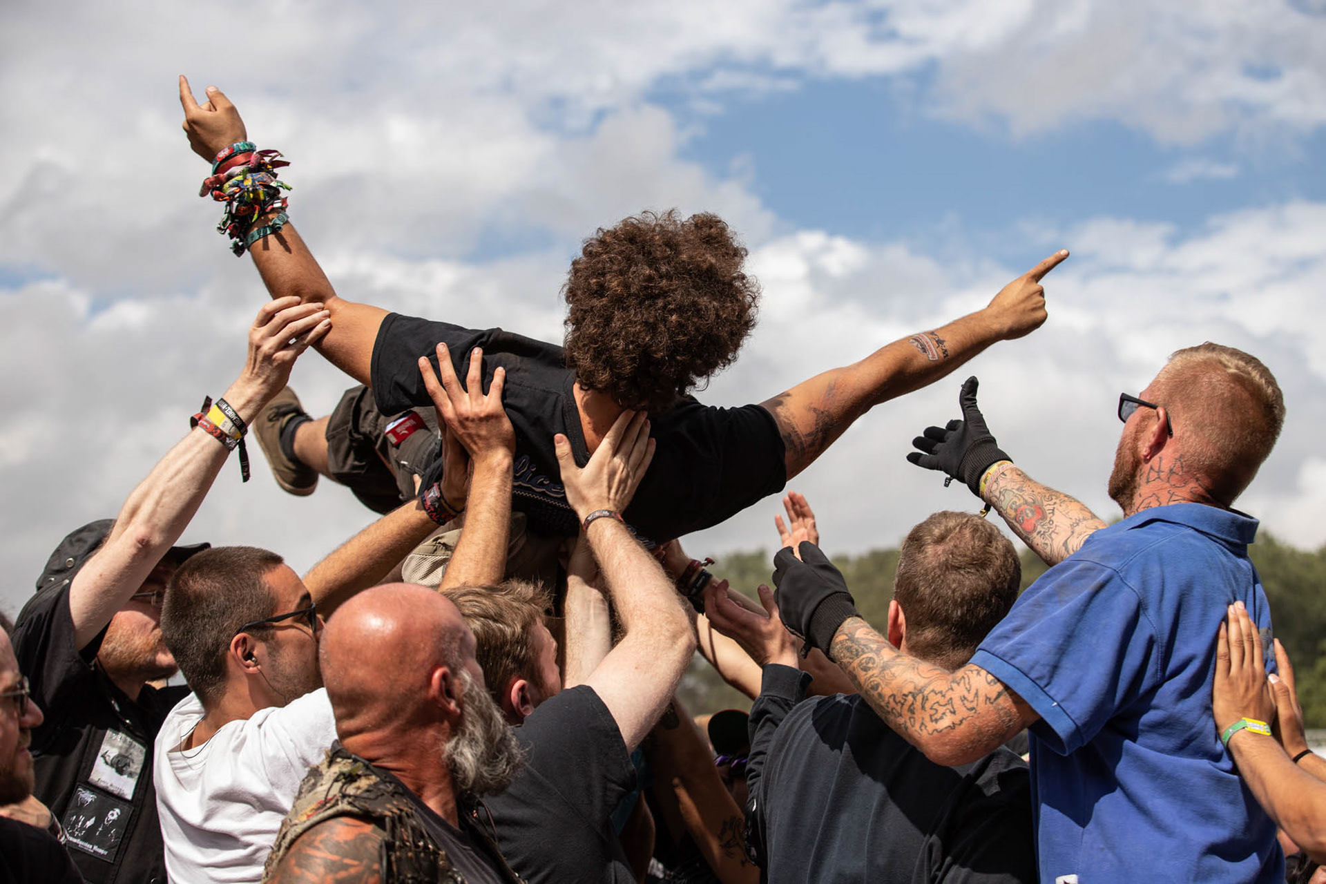 Metalheads at Wacken Open Air 2022, Crowdsurfing
