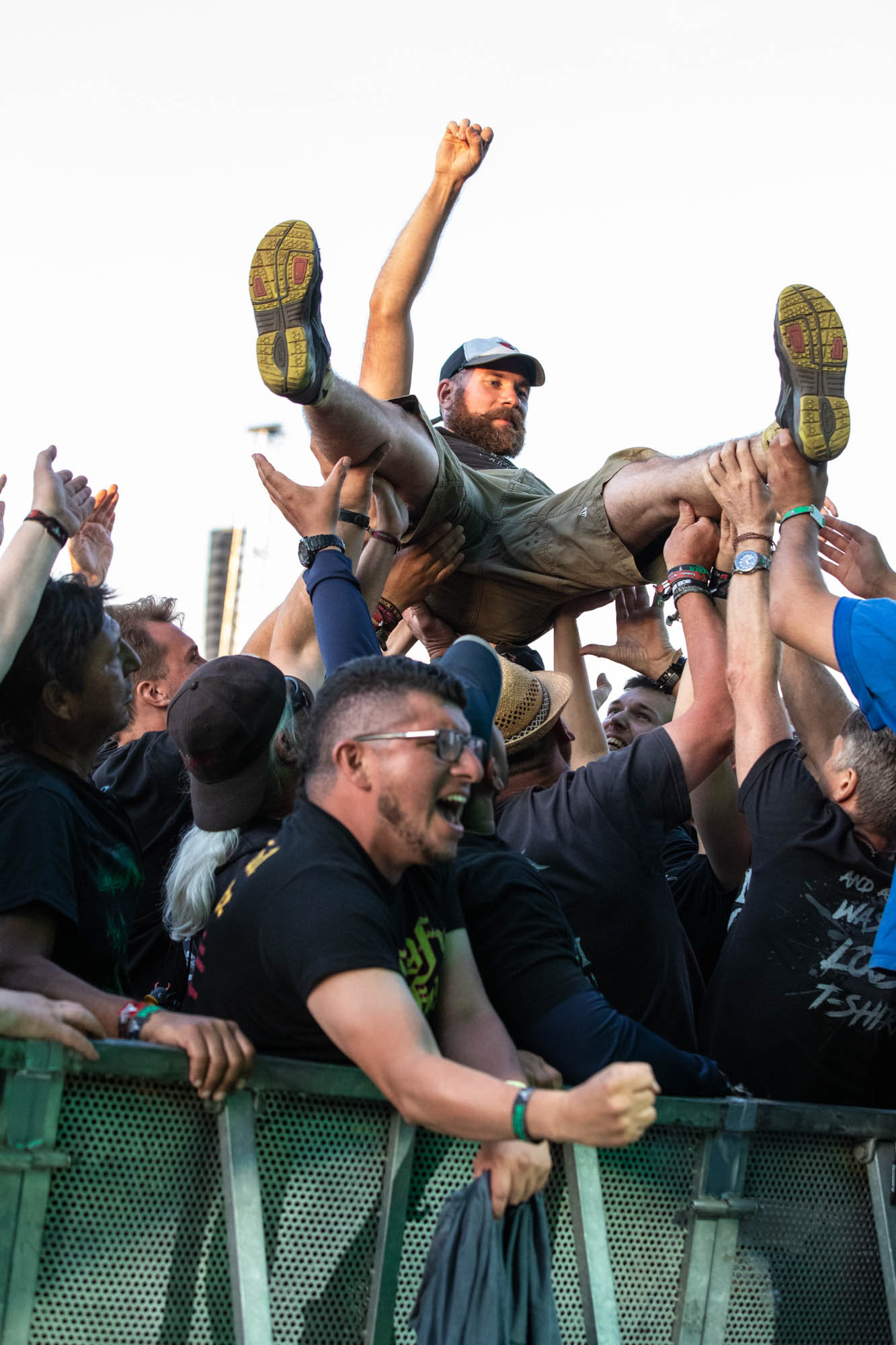Metalheads at Wacken Open Air 2022, Crowdsurfing