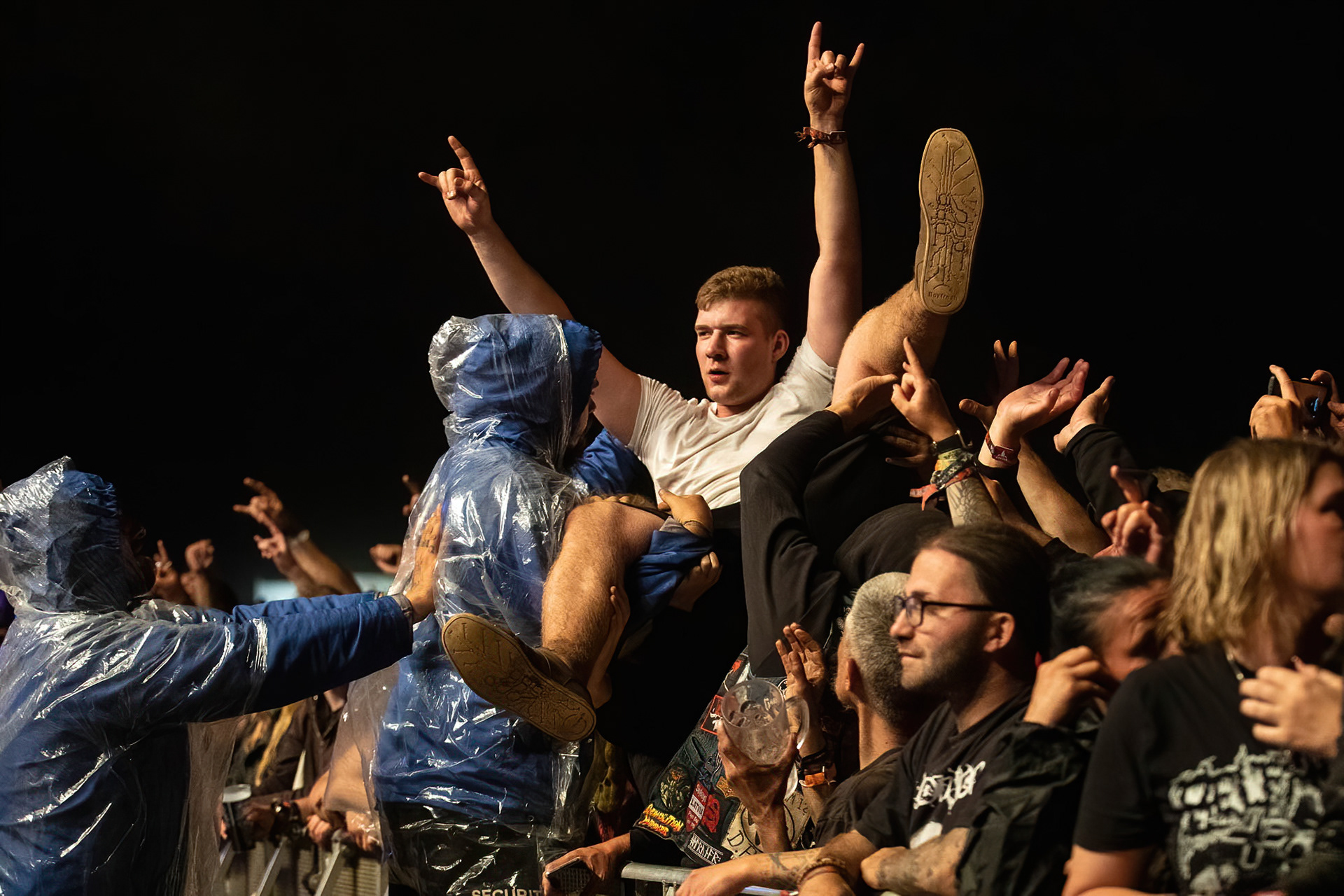 Metalheads at Wacken Open Air 2022, Crowdsurfing