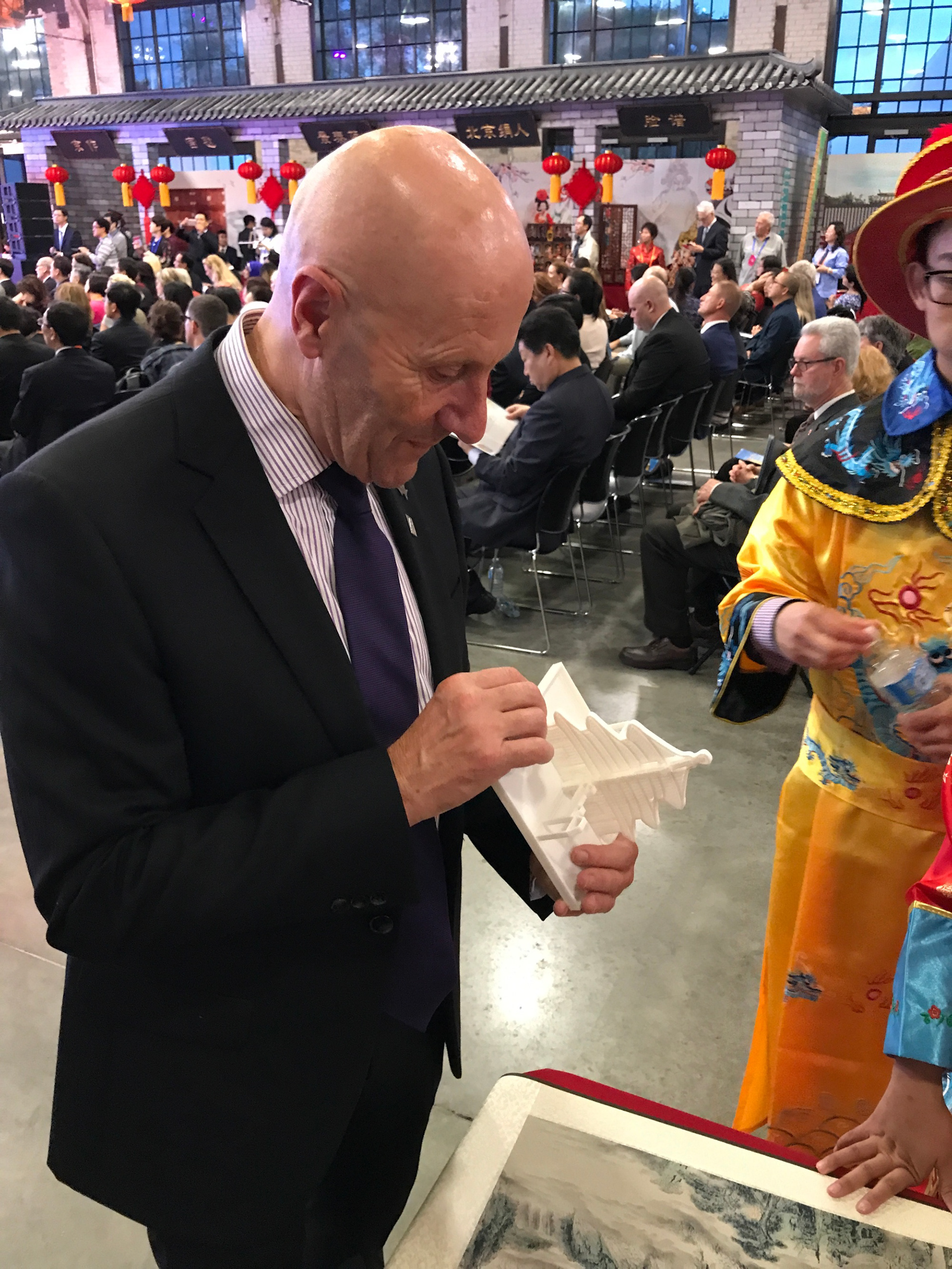 Carleton U President (Alistair Summerlee) looking at 3D print