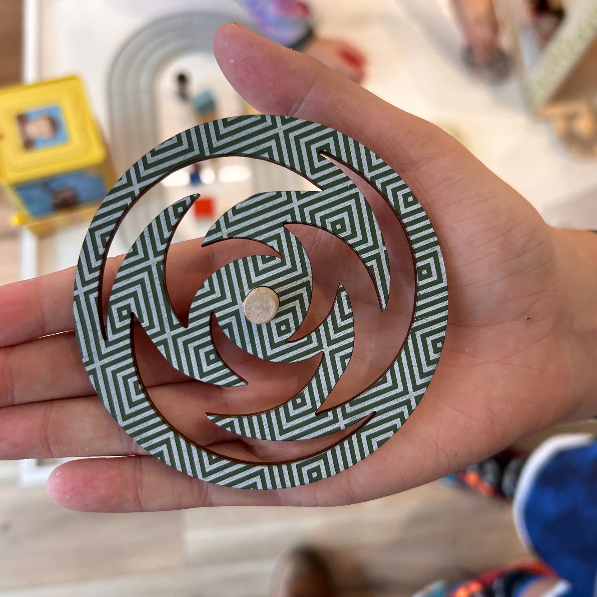 Printed, laser-cut spinning top