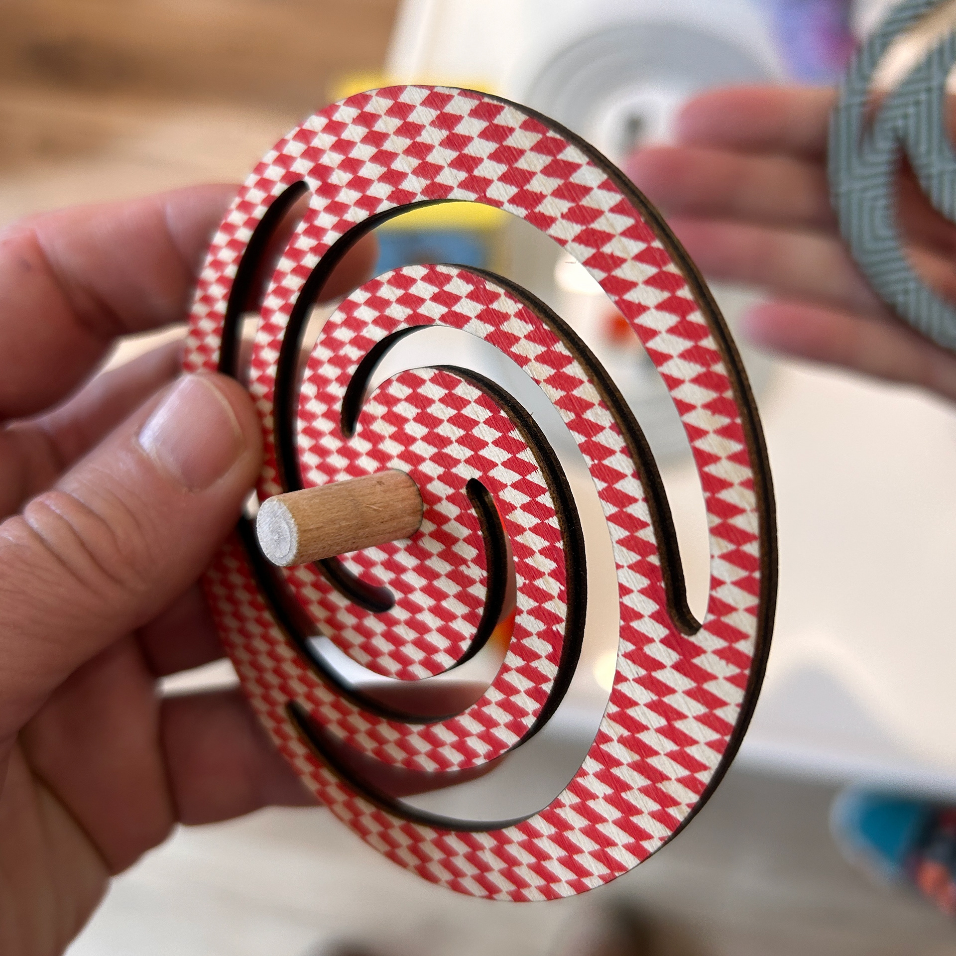 Printed, laser-cut spinning top