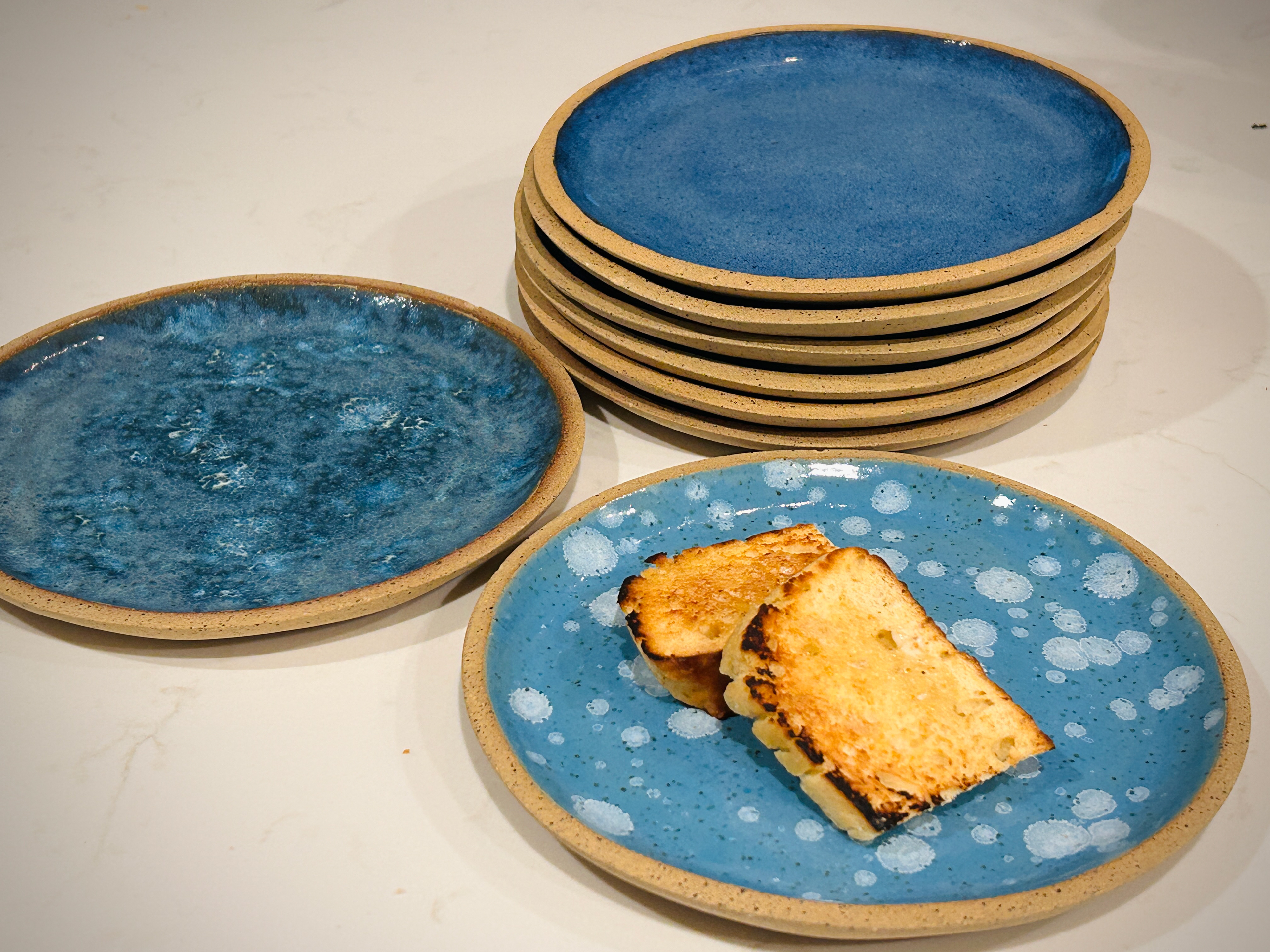 Handmade plates for homemade bread.