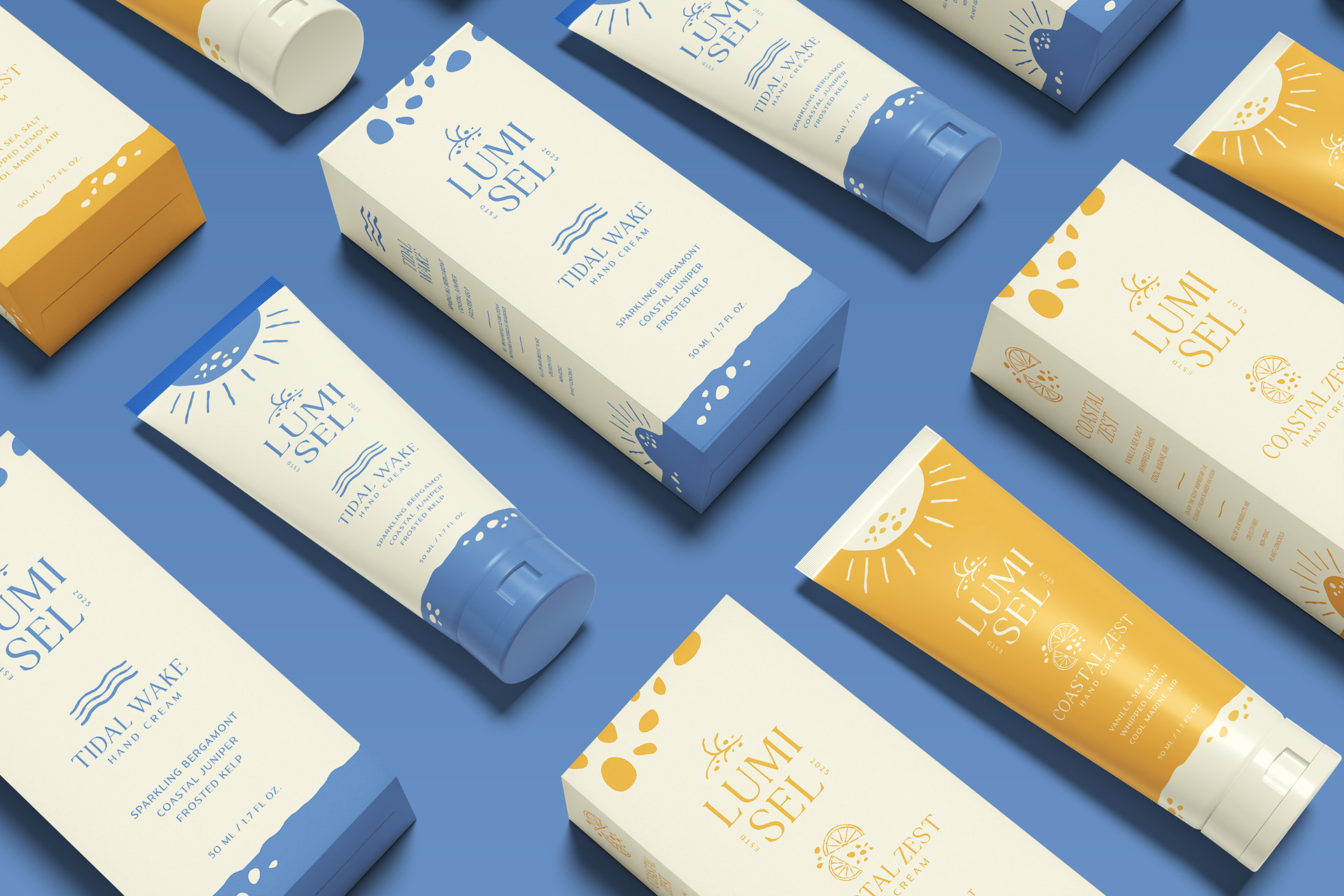 packaging of hand creams in two scents, Tidal Wake and Coastal Zest, and the accompaning boxes against a blue background