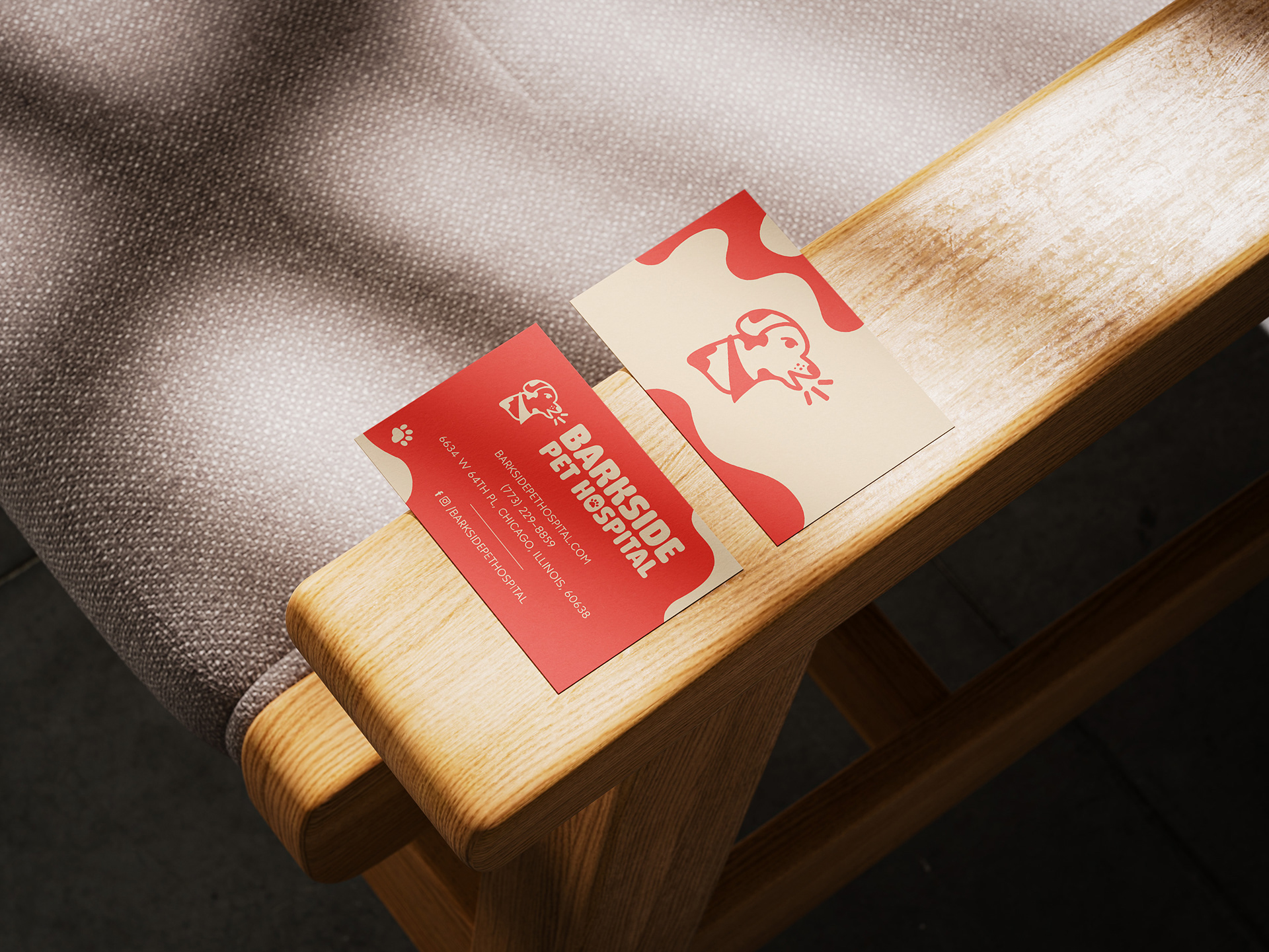 business card designs placed on an armchair