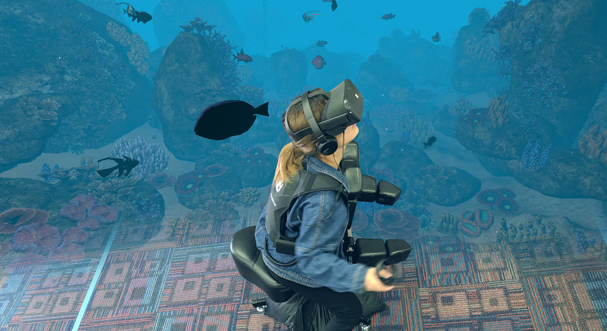 A backpack delivers synchronous vibrations to users' backs (shells).