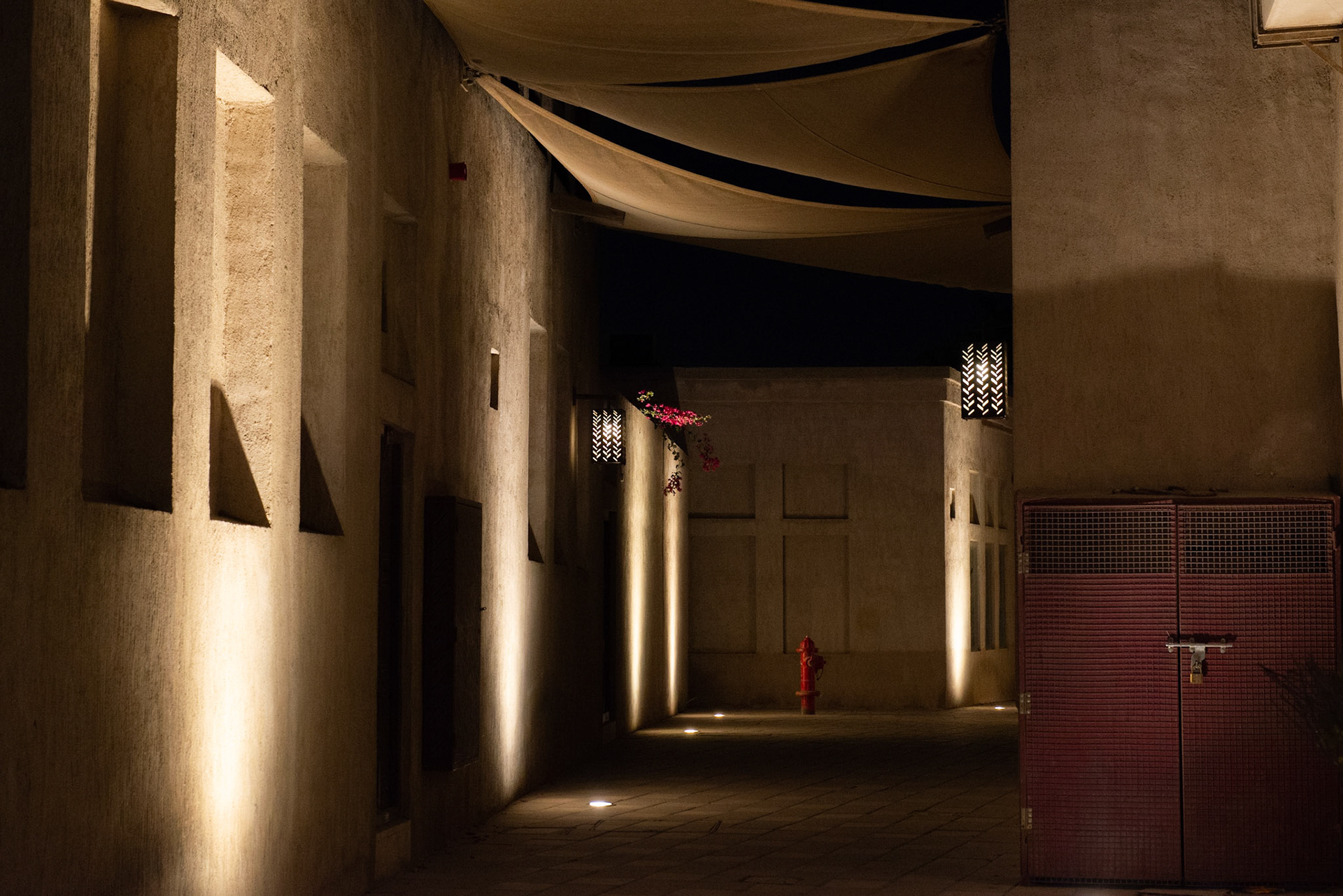 Street in Heritage Village covered with canvas by night, Dubai, UAE