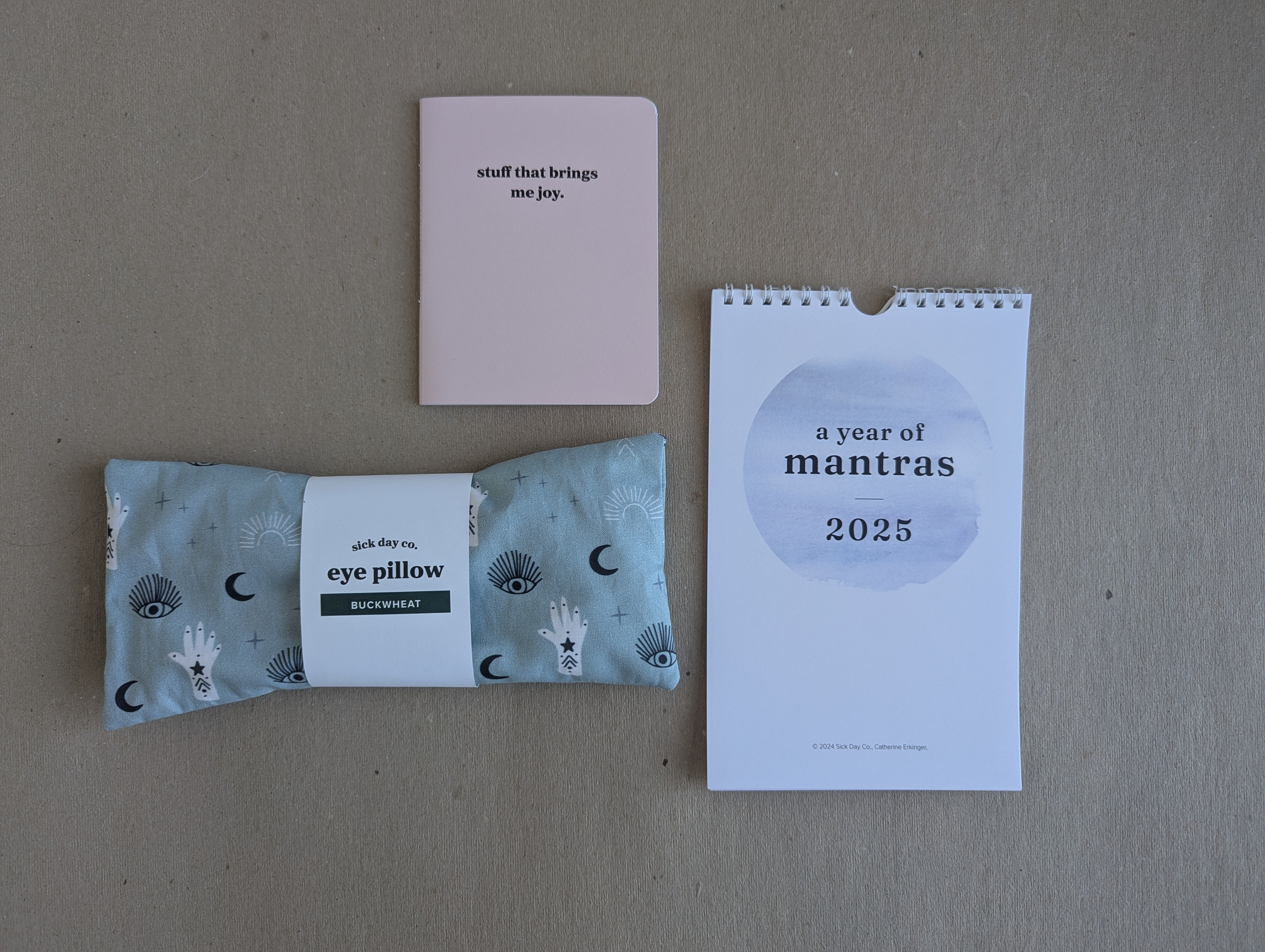 Gift set example with an eye pillow, notebook and calendar