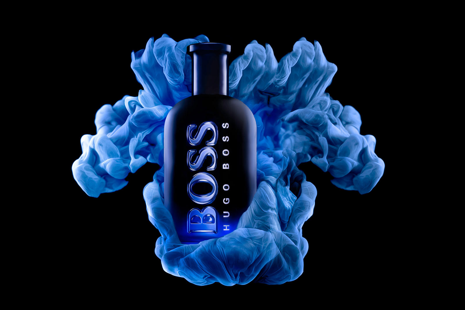 aftershave bottle with ink drop surrounding | product photo | Pro Exposure Photography