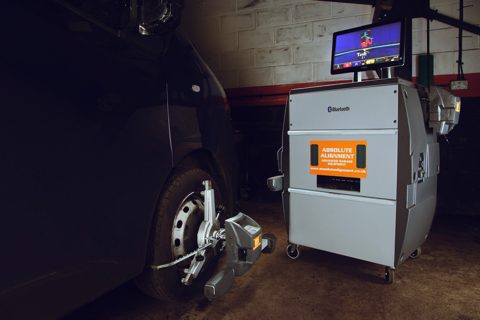 Wheel alignment machine in a garage location | COmemrcial location photography | Pro Exposure Photography