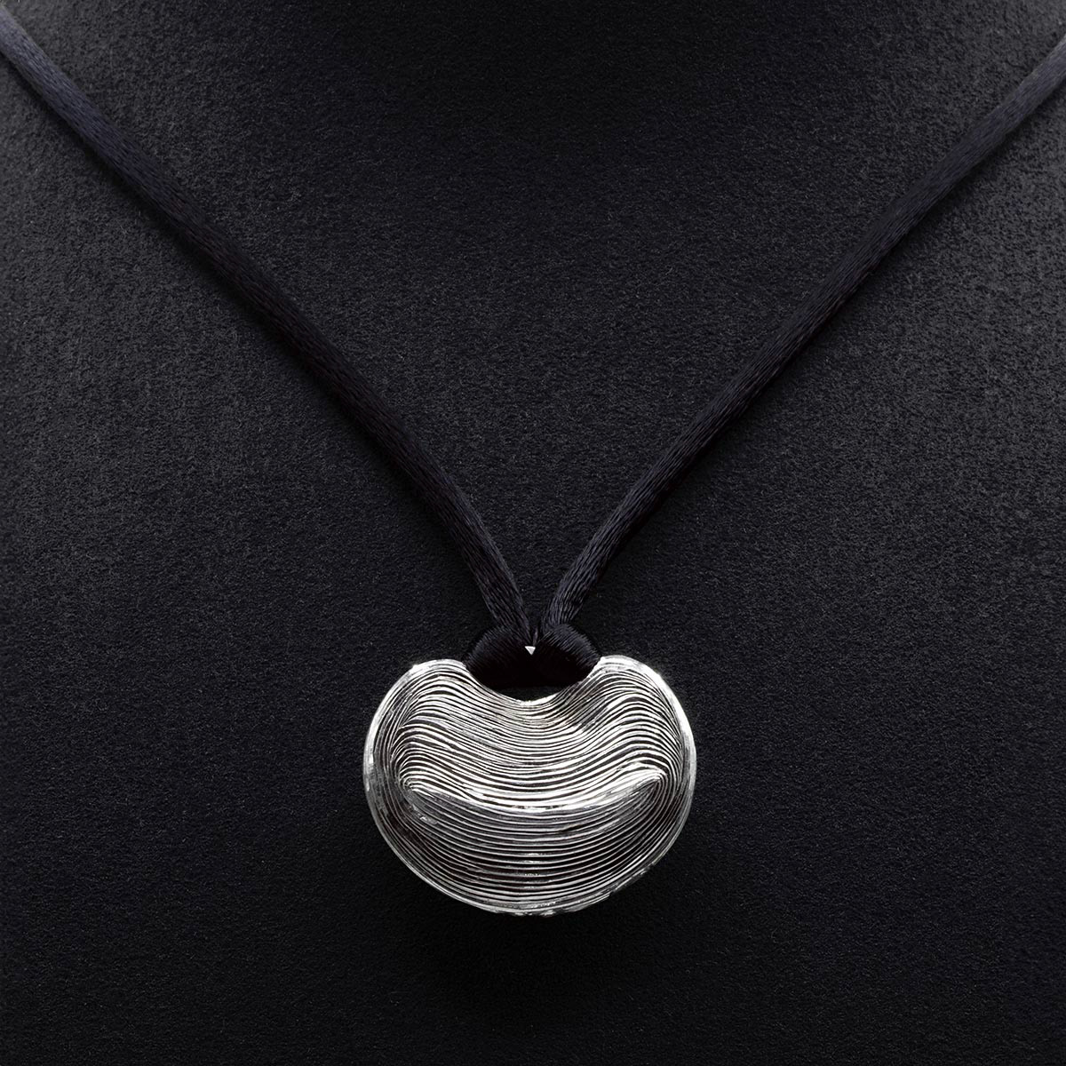 Kiki Fornell silver and silk necklace.