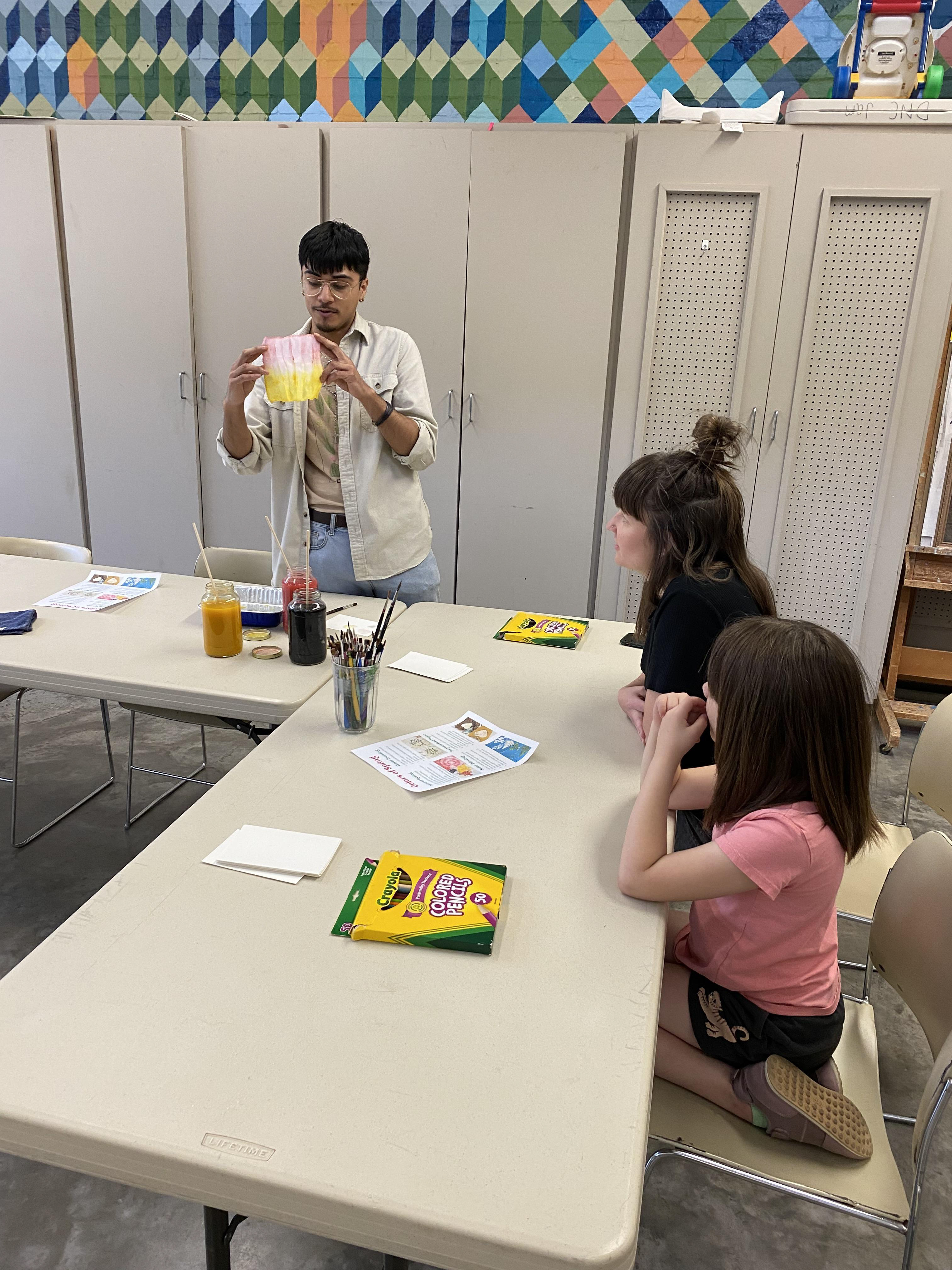 Student Jonathan DeLaCruz demonstrating dye separations