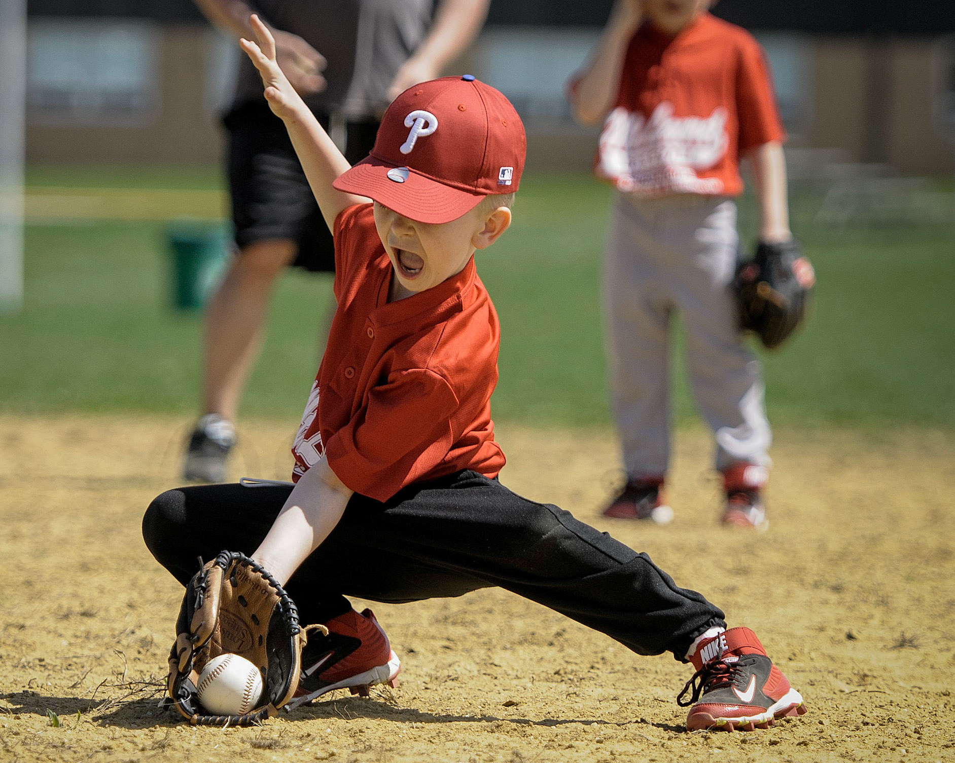 On the first play of the first game of the year, and this kid's first game, the batter popped one up and he made the catch.