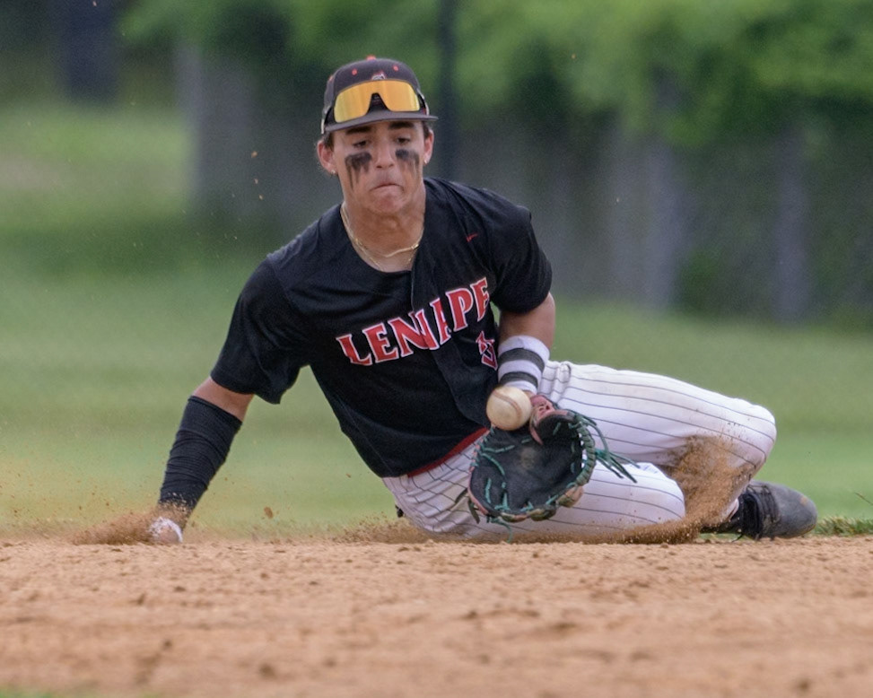 Dante D'Ambra of Lenape High School fields a ground ball at second base in a game against Vineland High School. (Photo by Brian Barbash/gametimedreams.com)