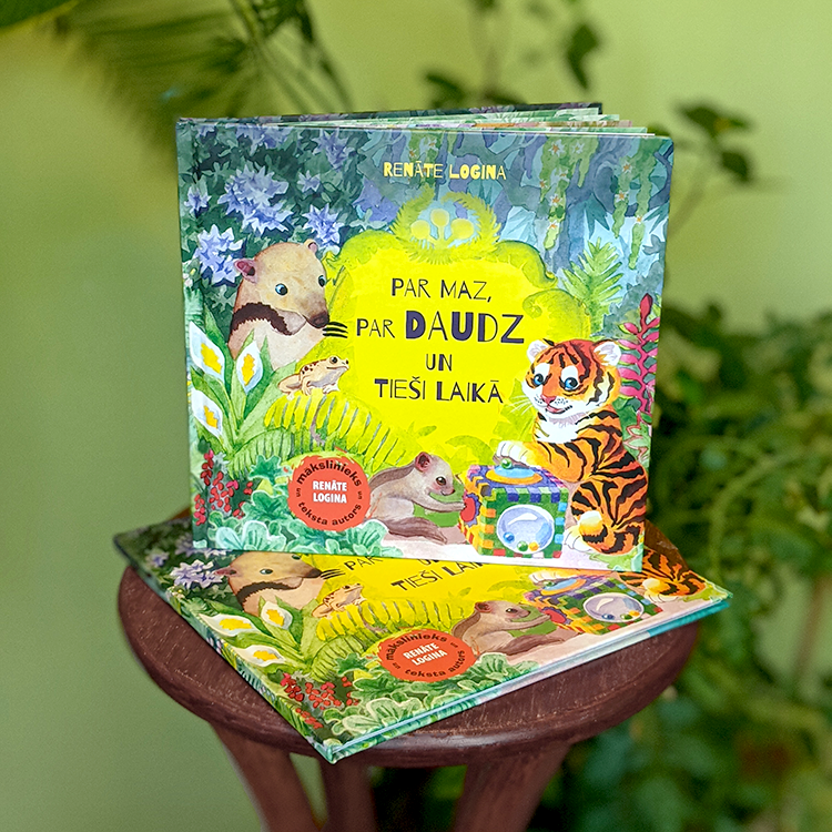 Photo of books "Too little too much and just in time", Latvian edition by Latvian author and illustrator Renate Logina (RenLoArt). Foto ar grāmatu "Par maz, par daudz un tieši laikā". Watercolors.