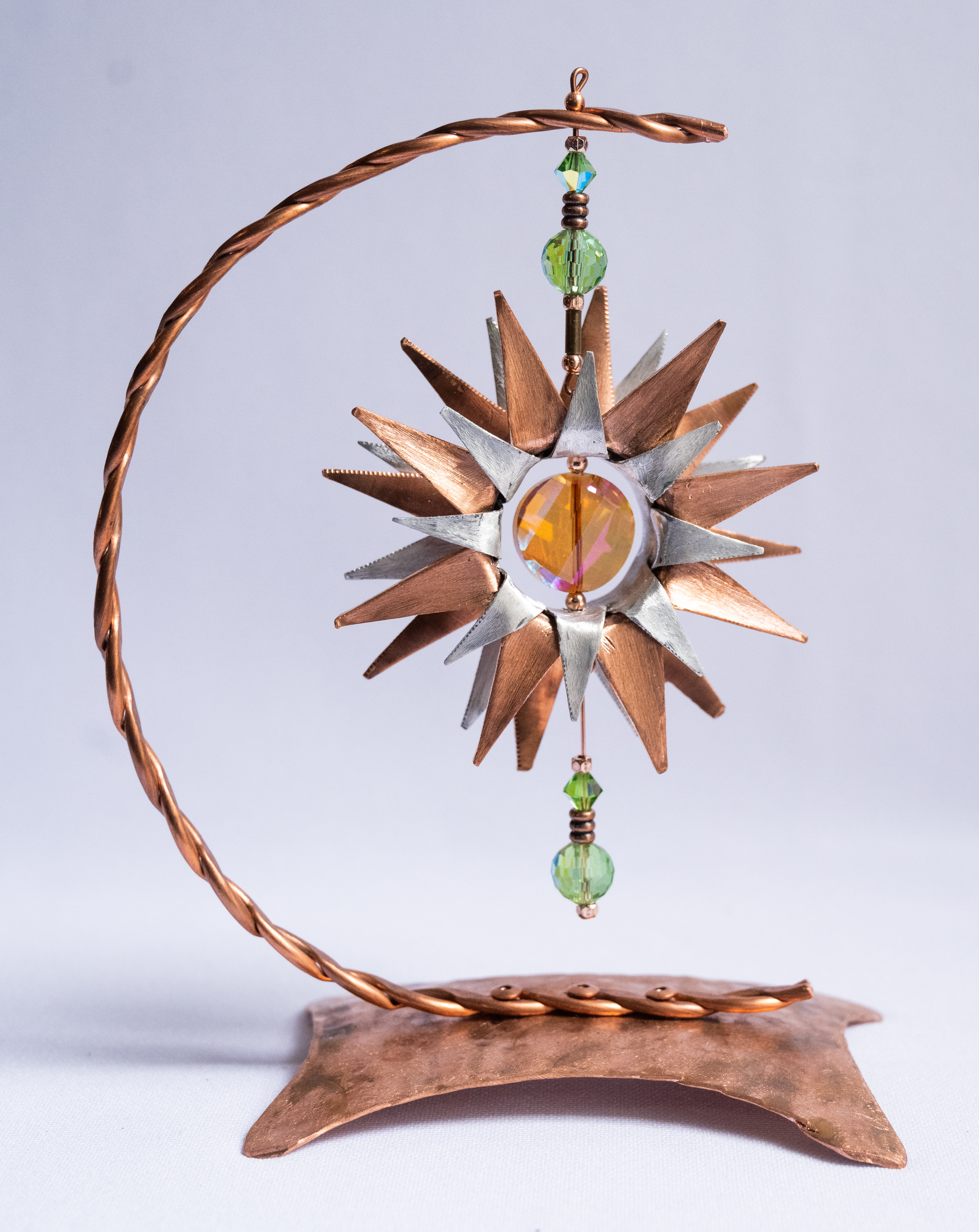 Emerald, 4w x 6h x 2.75d, copper and aluminum flower with crystal centre on copper base, $125
