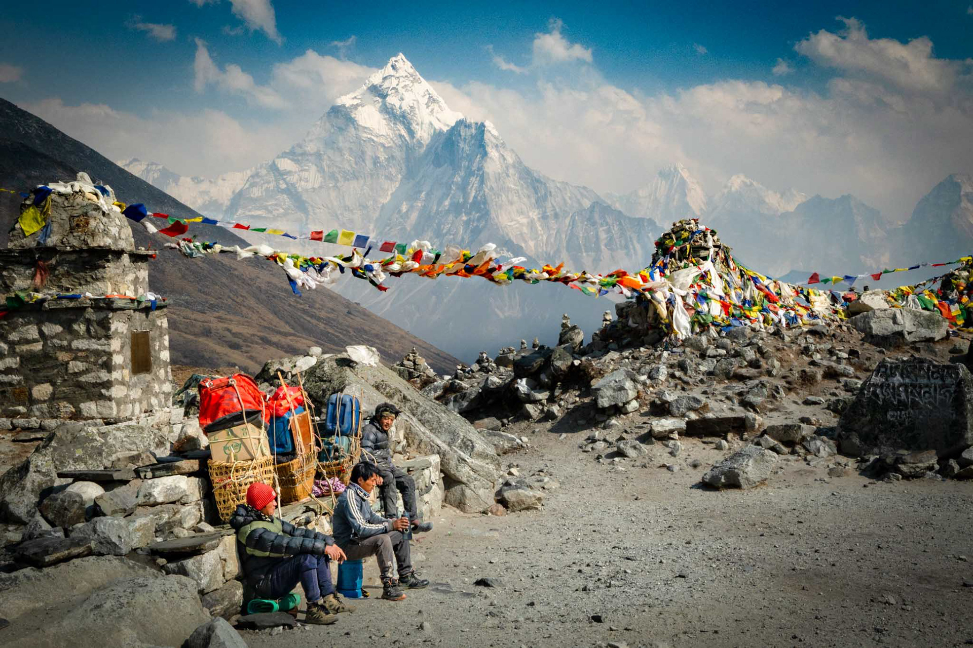 Porters resting at Thukla Pass in Everest region