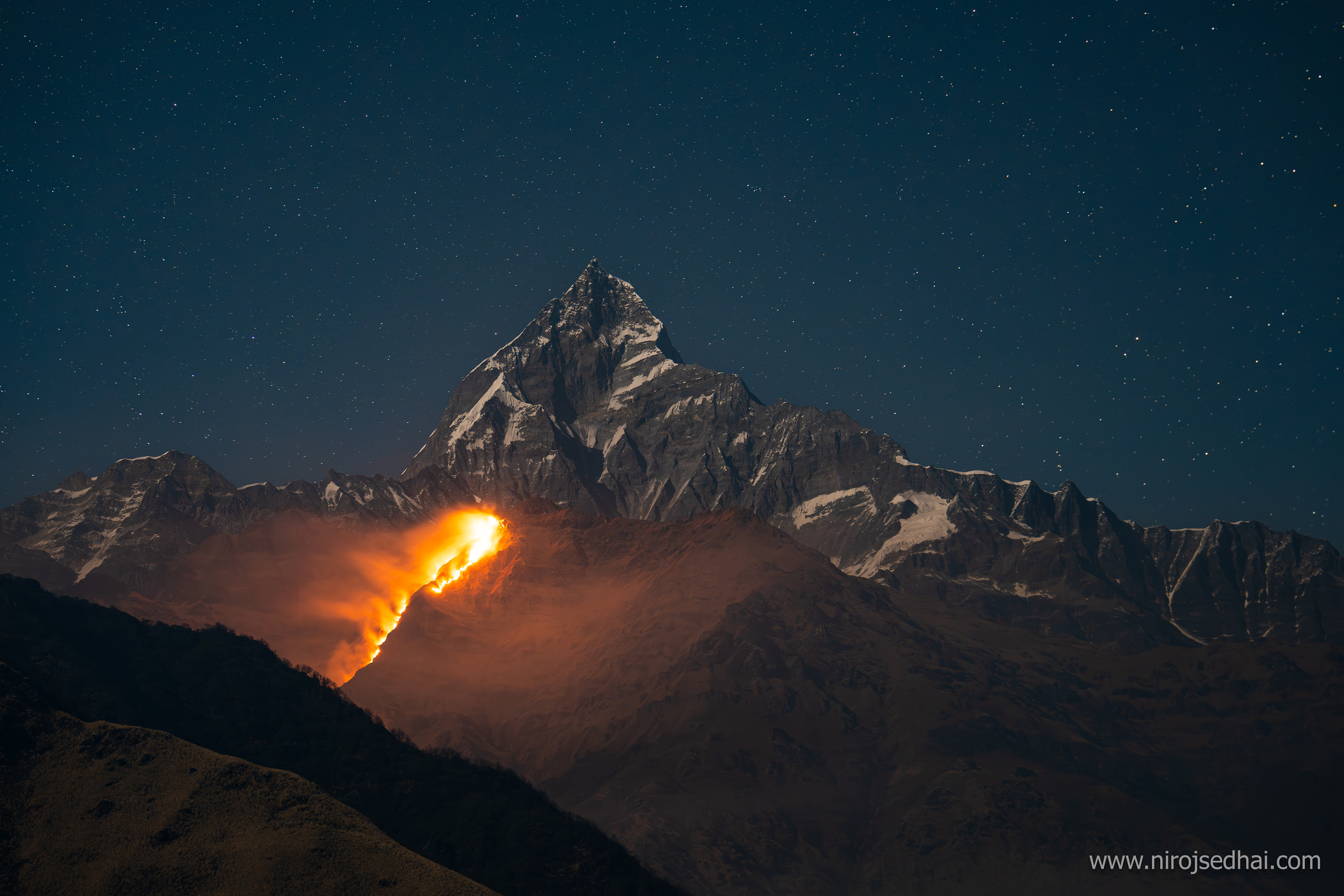 Fire and Ice; Wildfire at the base of Machhapuchre/Fishtail mountain