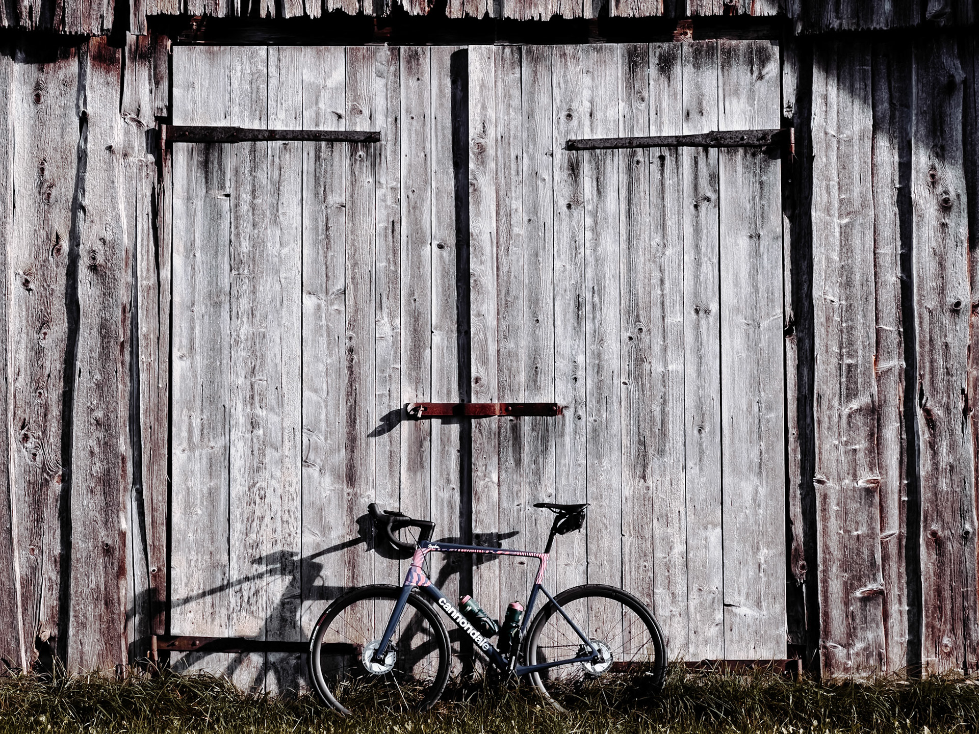 Roadbike in front of a barn