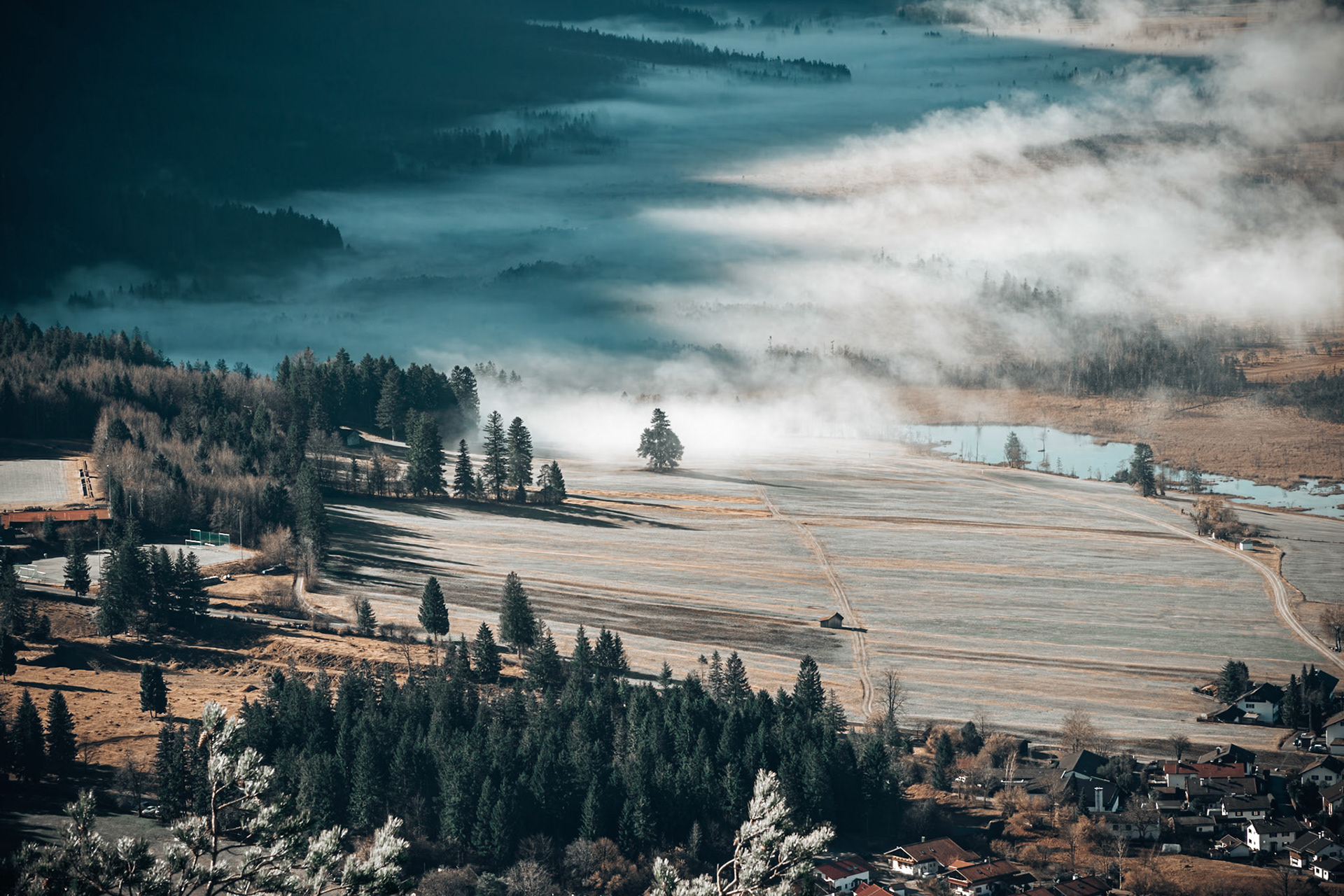 Fog vs sun in the Loisachtal