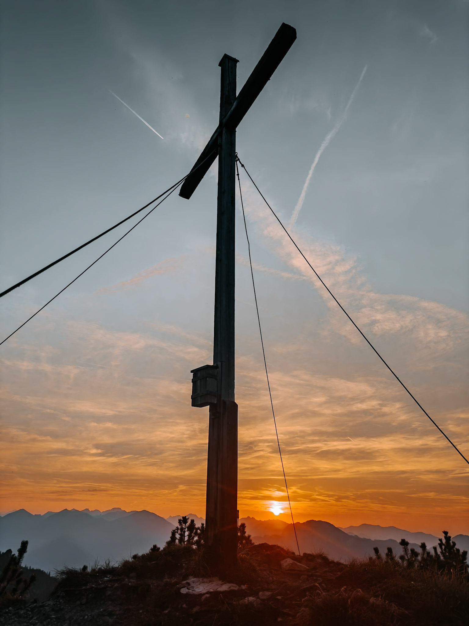 Summit cross during sunset