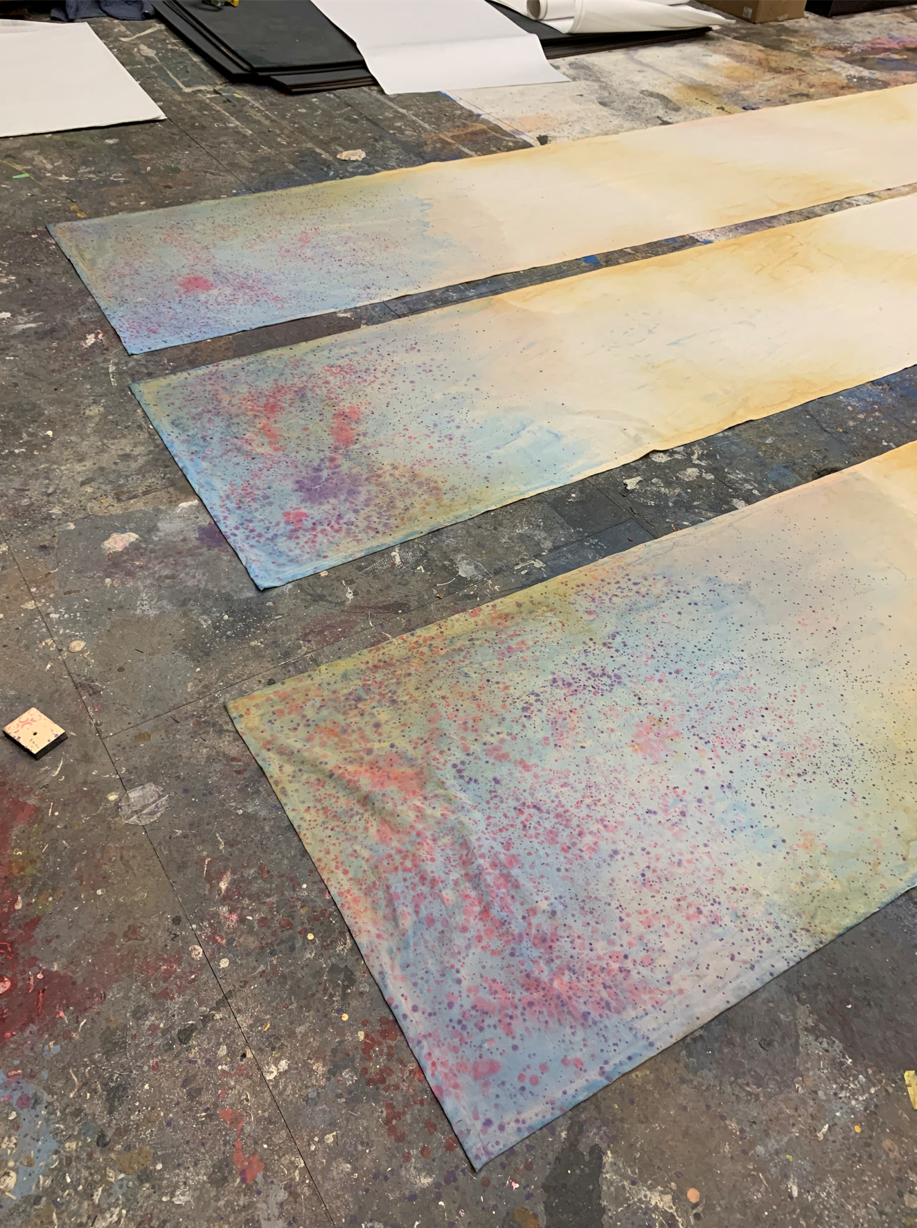 Painted muslin strips using garden sprayer