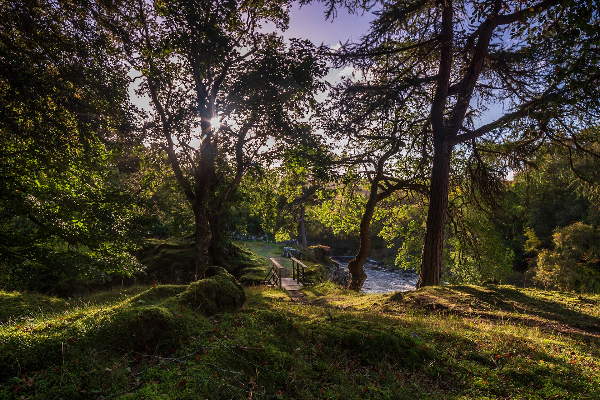 A bohemian scene beside the dramatic falls at Glen Cassley.