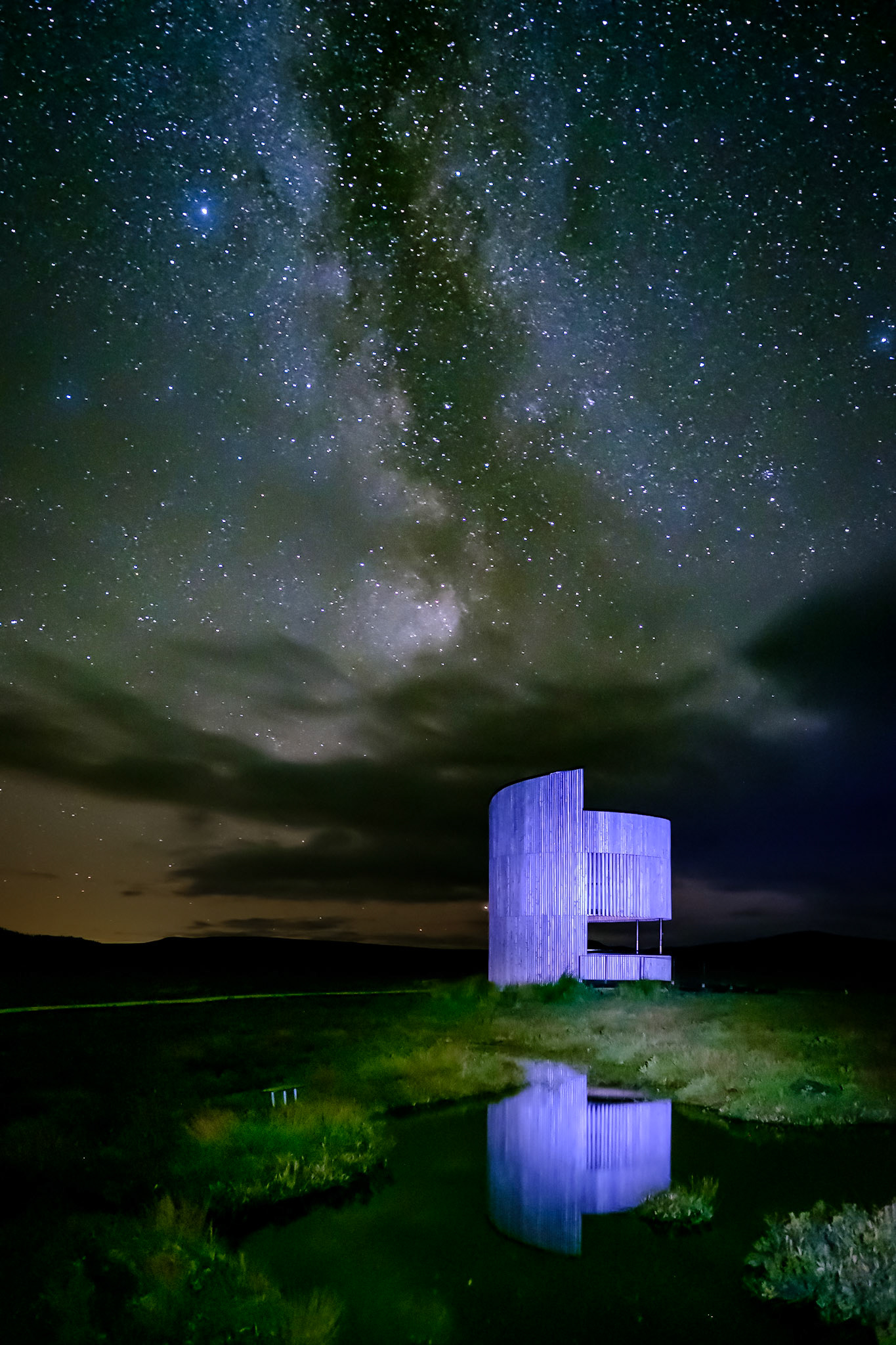 The award-winning RSPB Lookout Tower at Forsinard Flows, with milky way