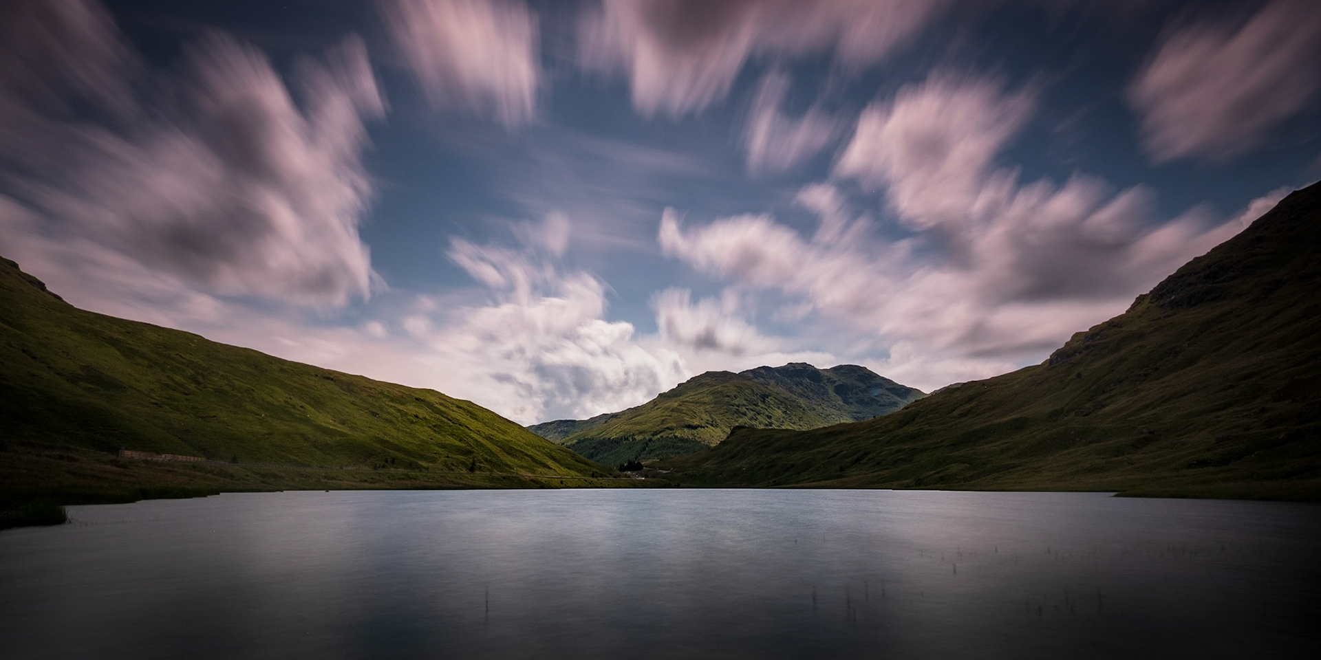 Fast moving clouds as a sense of drama to this view down Loch Restil in Argyle.