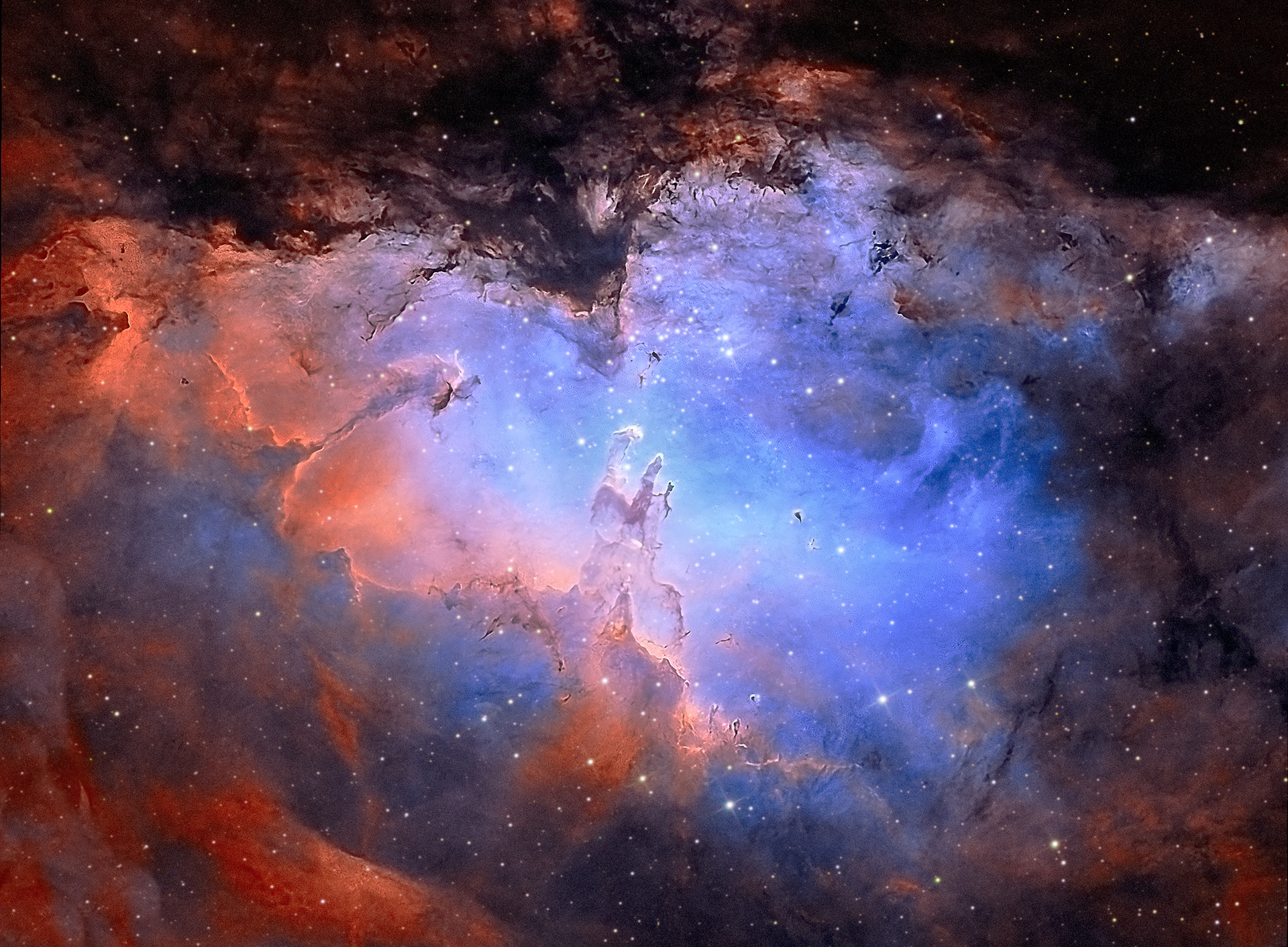 The Eagle Nebula (M16) is a star forming region located in Serpens. It is a well-known emission nebula surrounding a young open star cluster. Messier 16 is best known for the famous Pillars of Creation, a region where intense star forming activity is taking place. The region was imaged by the Hubble Space Telescope in the 1990s. The Eagle Nebula in fact contains several active starburst regions. The Eagle Nebula was named for its shape, which resembles that of an eagle. SHO