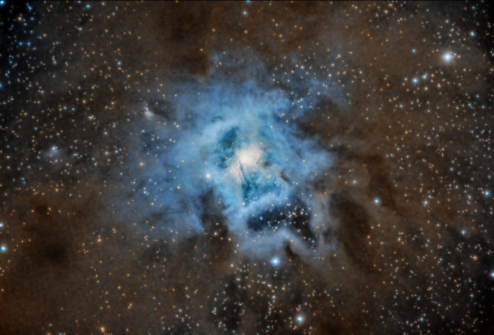 The Iris Nebula is a bright reflection nebula in the constellation Cepheus. The nebula, which shines at magnitude +6.8, is illuminated by a magnitude +7.4 star.