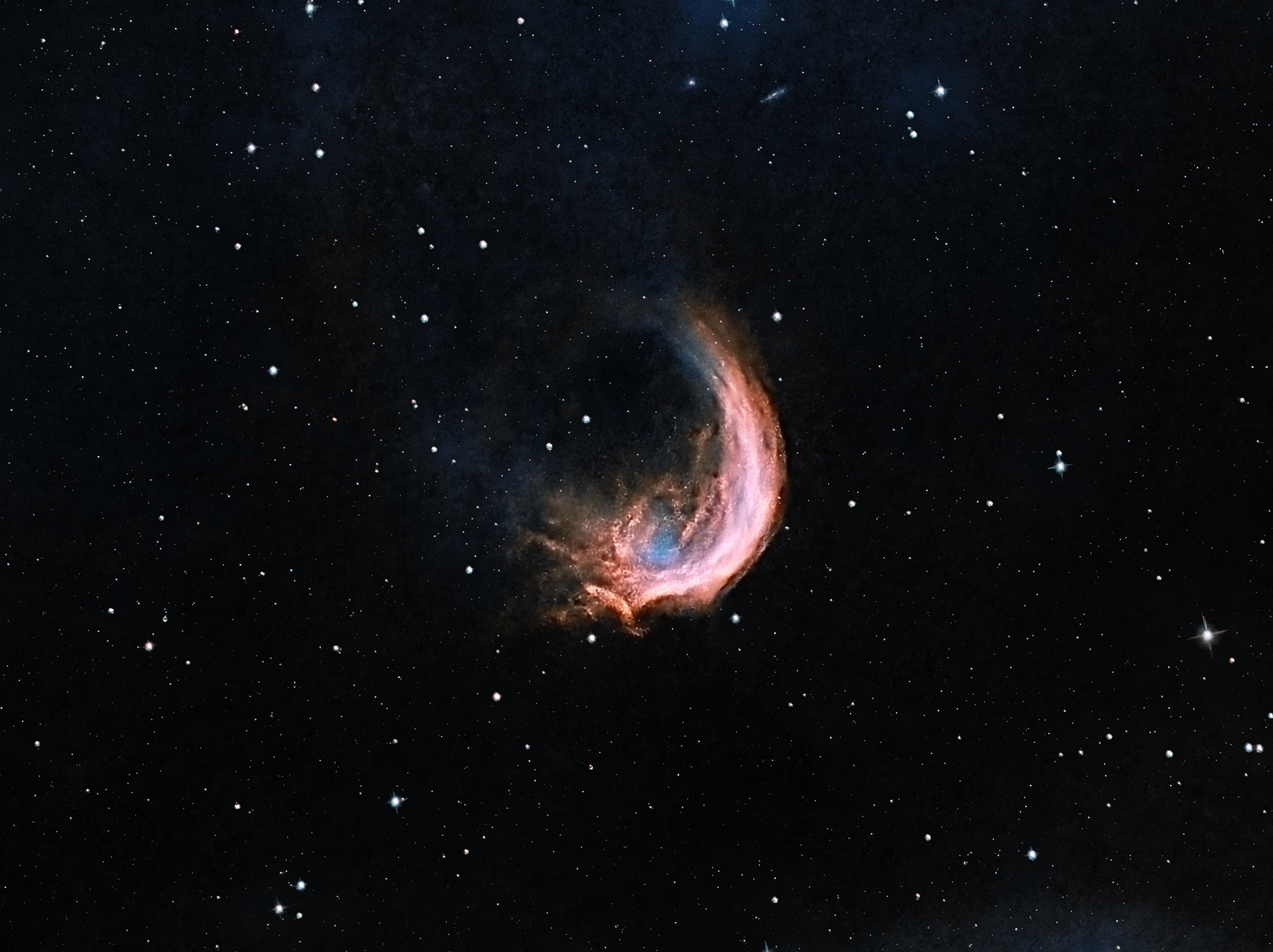 The Prawn or Shrimp Nebula (SH2-188) is an emission nebula located in the constellation Scorpius. It has an apparent magnitude of 7.31 and lies at a distance of 6,000 light years from Earth. Located to the south of Antares, the nebula is about 250 light years in diameter, corresponding to an apparent size of 1.5 degrees, or 3-4 times the size of the full Moon. LRGB