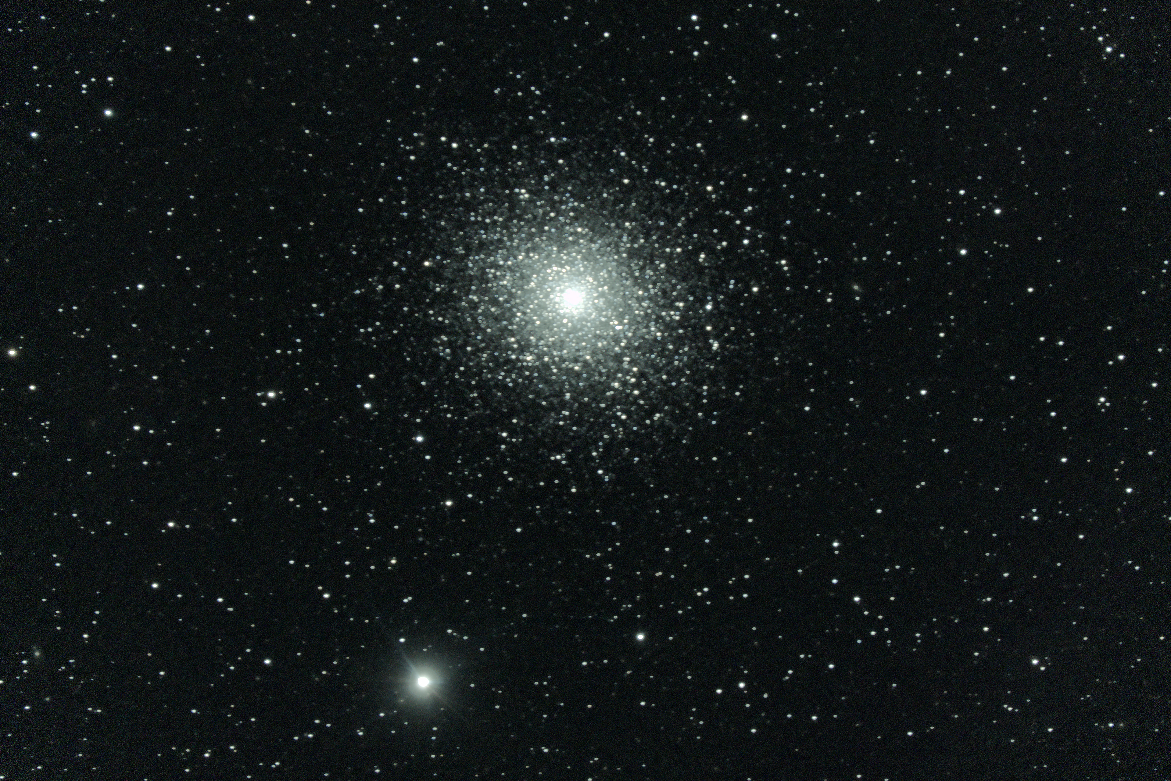 M5 is a globular cluster in the constellation Serpens. It is around 12 billion years old, and is 25,000 light years from us. Celestron 8" SCT, AVX mount, Canon 5D camera.