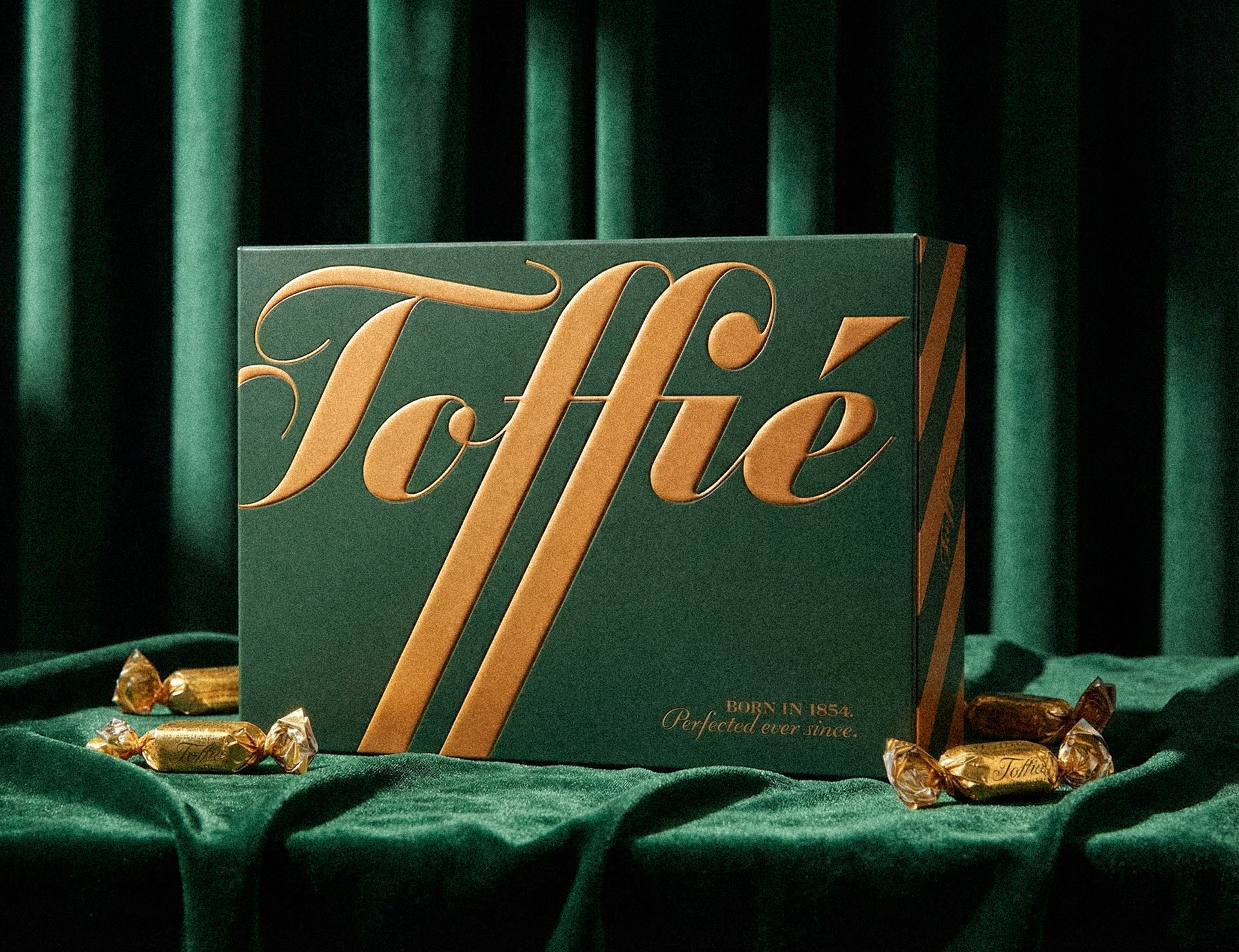 Hand-crafted retro toffee packaging design with luxurious vintage aesthetics and traditional typography — brand identity by McKenzie Design