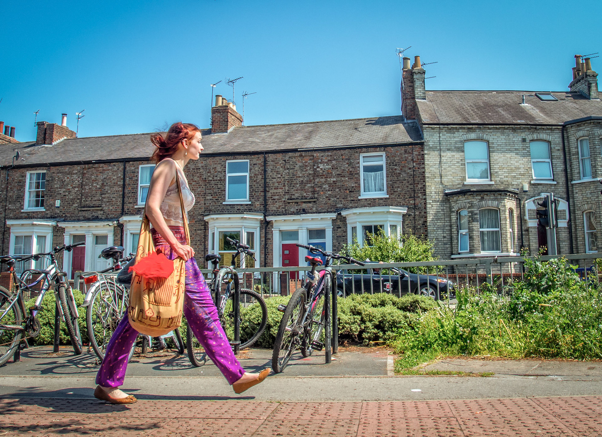 Colourful student walking around York.