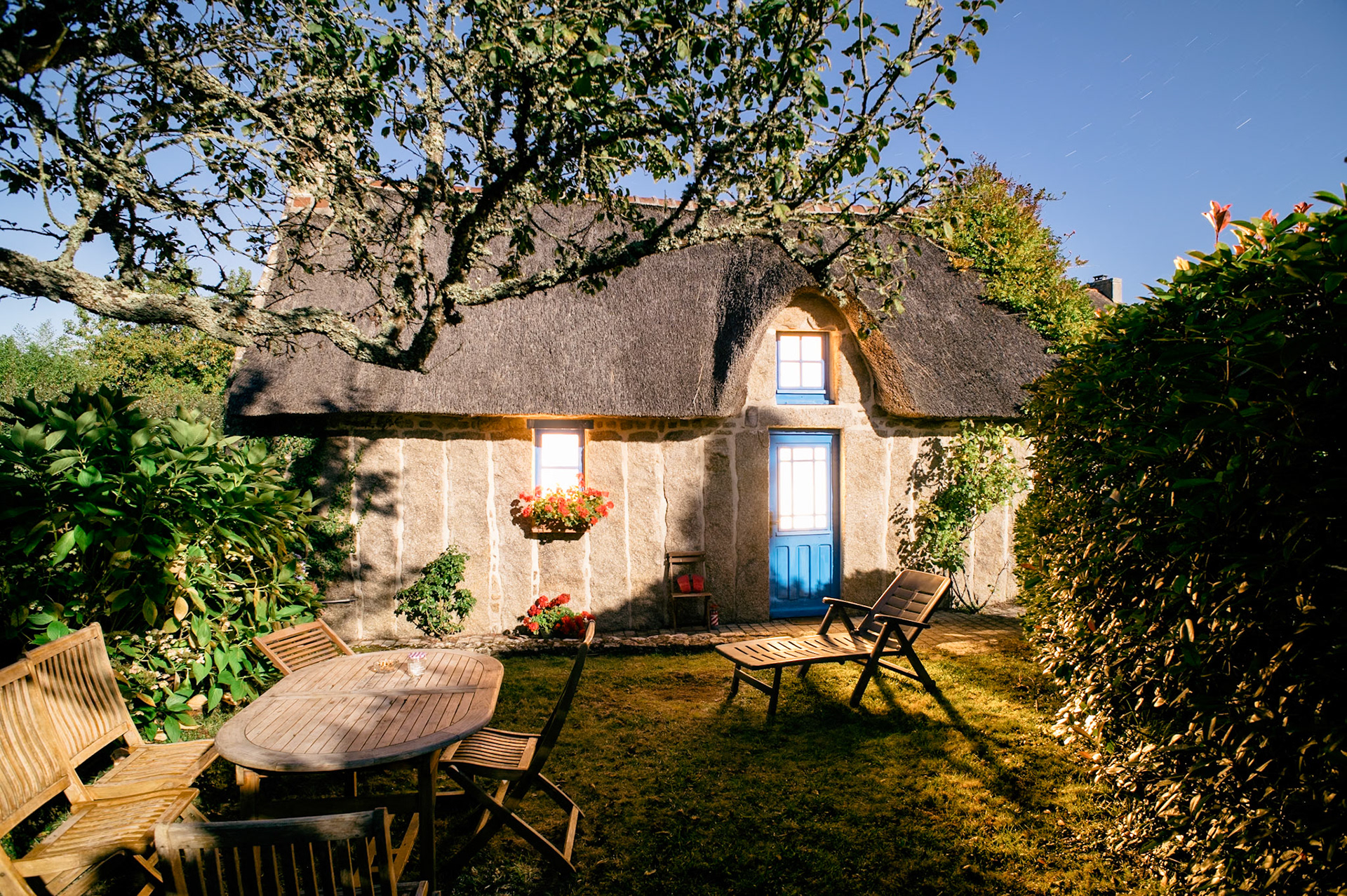 Breton cottage in bright moonlight