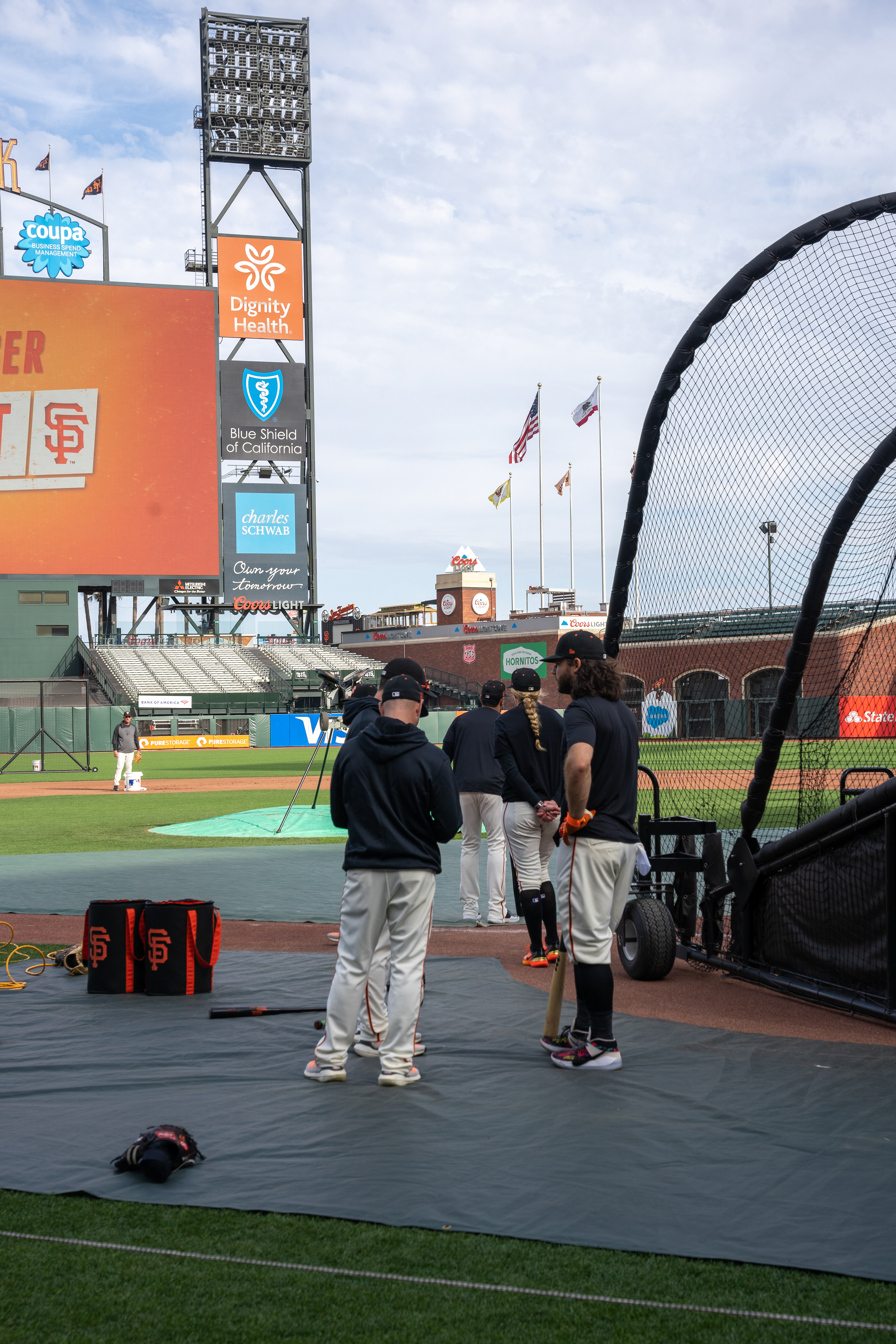 Crawford talks with a SF Giants coach.