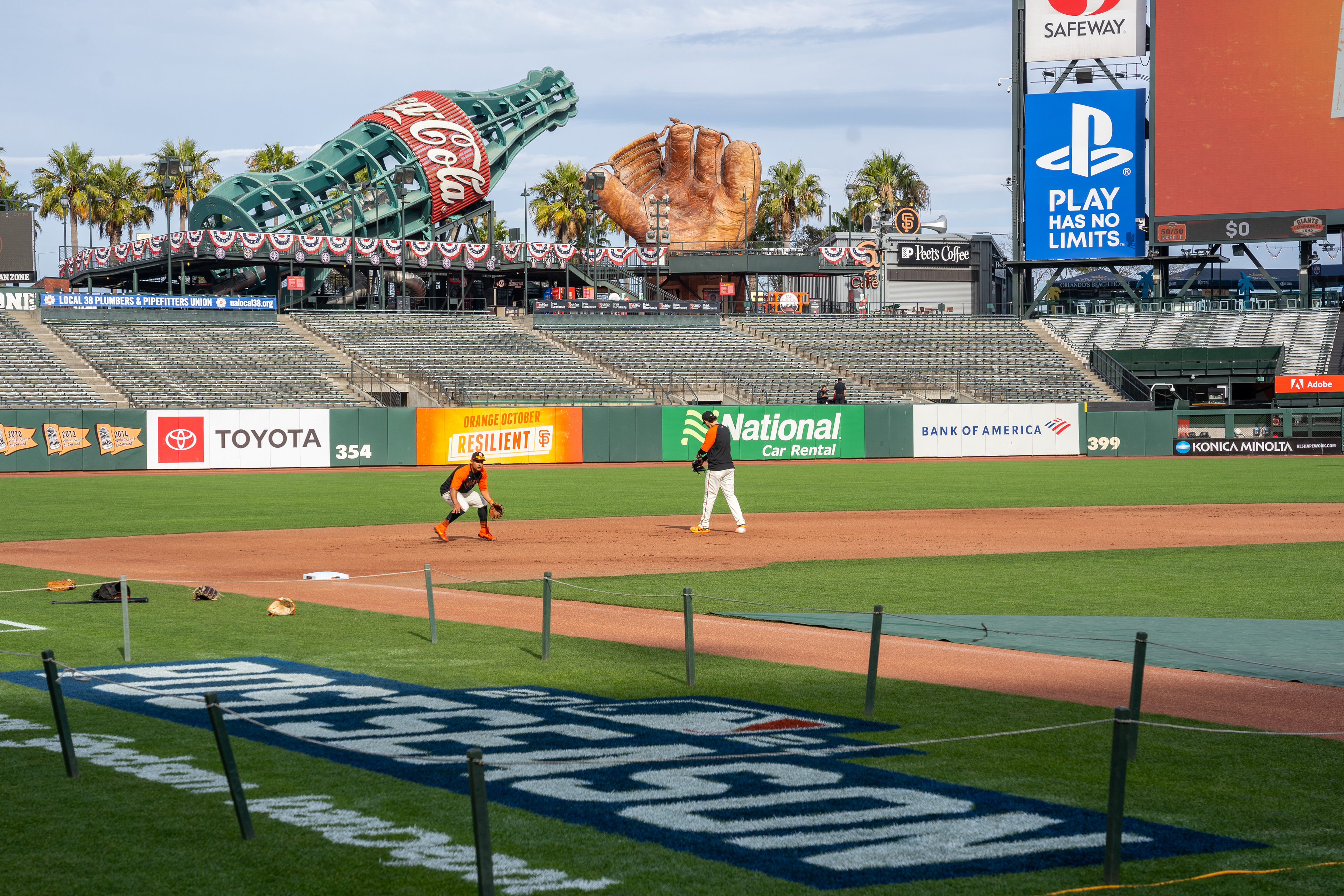 Infielders take grounders.