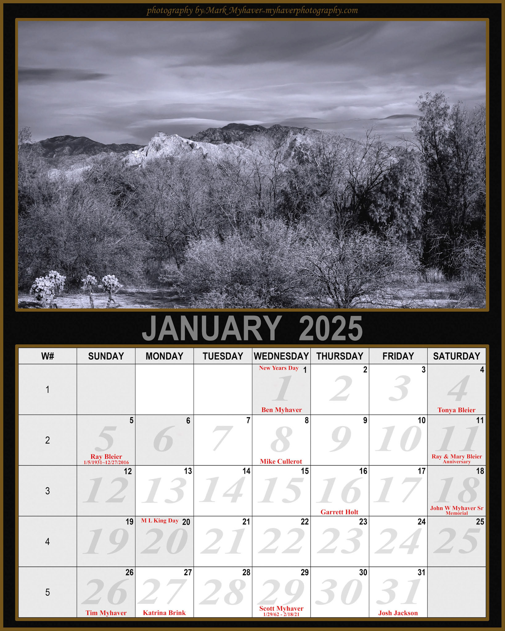 The January 2025 Calendar features "Mountain Cloud Synthesis 25459". A stark black and white landscape displays a contrast between the rugged mountain peaks in the background and the dense brush in the foreground under a dramatic sky. The absence of color emphasizes the textures and forms in the scene, creating a somber and timeless mood.Sonoran DesertOro ValleyArizona USA