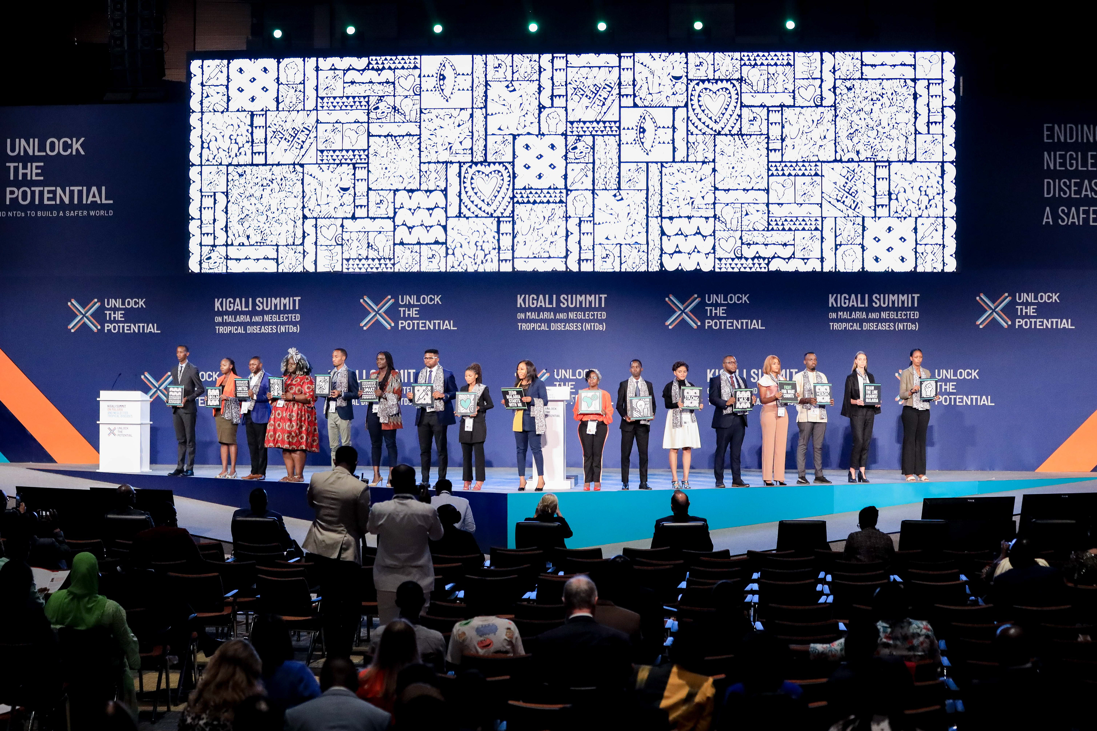 Delivery of the Draw The Line Against Malaria campaign on stage at the Kigali Summit