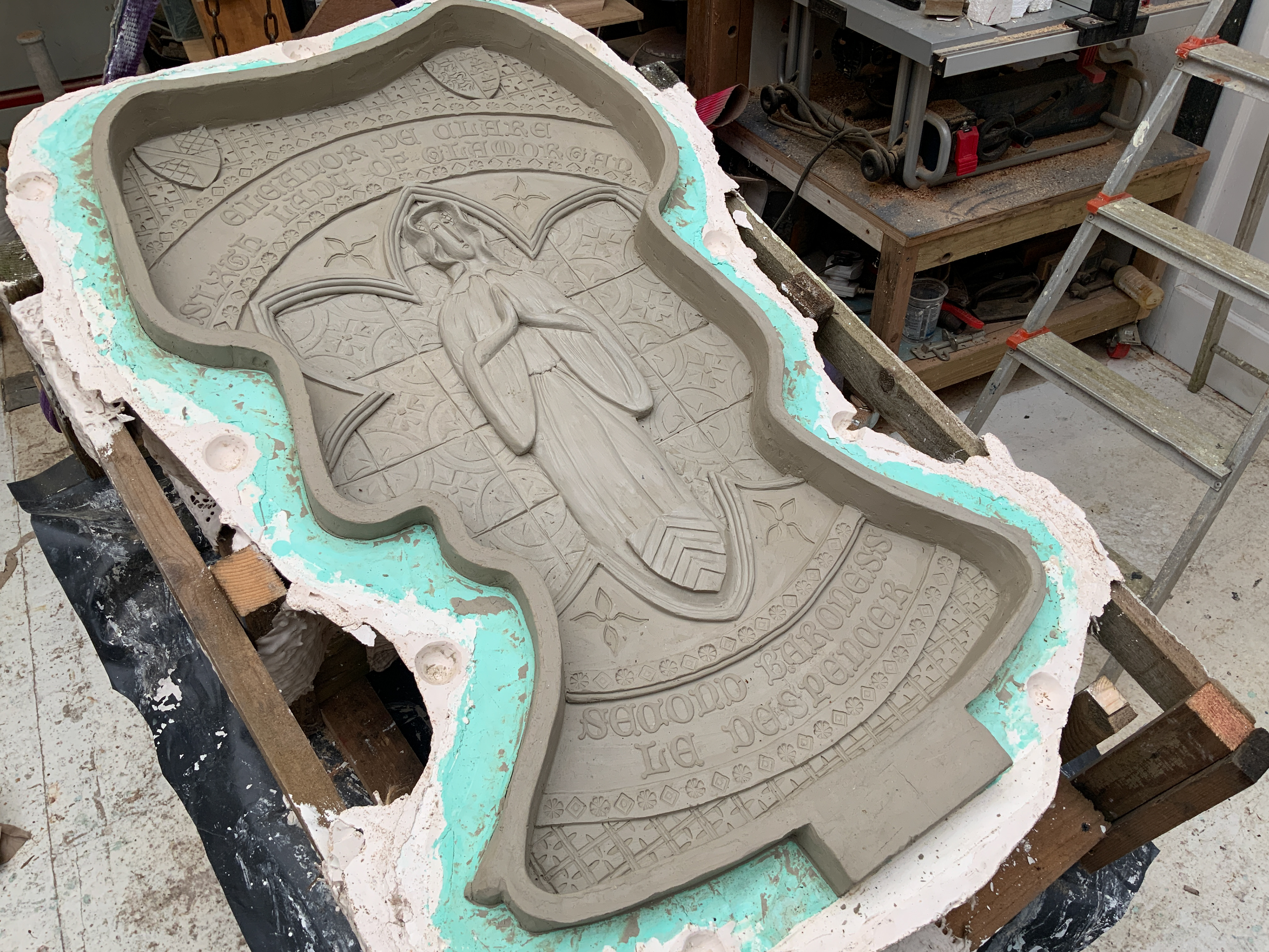 With the front moulded in plaster of paris the back is modelled in clay